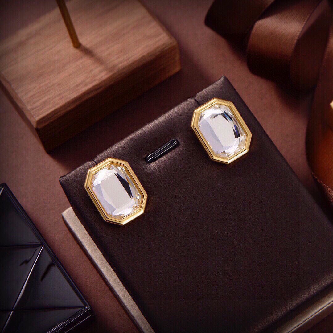 Martin Graham stud earrings in polished metal-tone – detail view