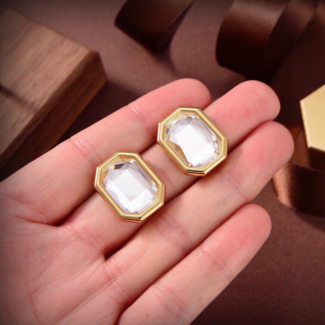 Martin Graham stud earrings in polished metal-tone – front product view