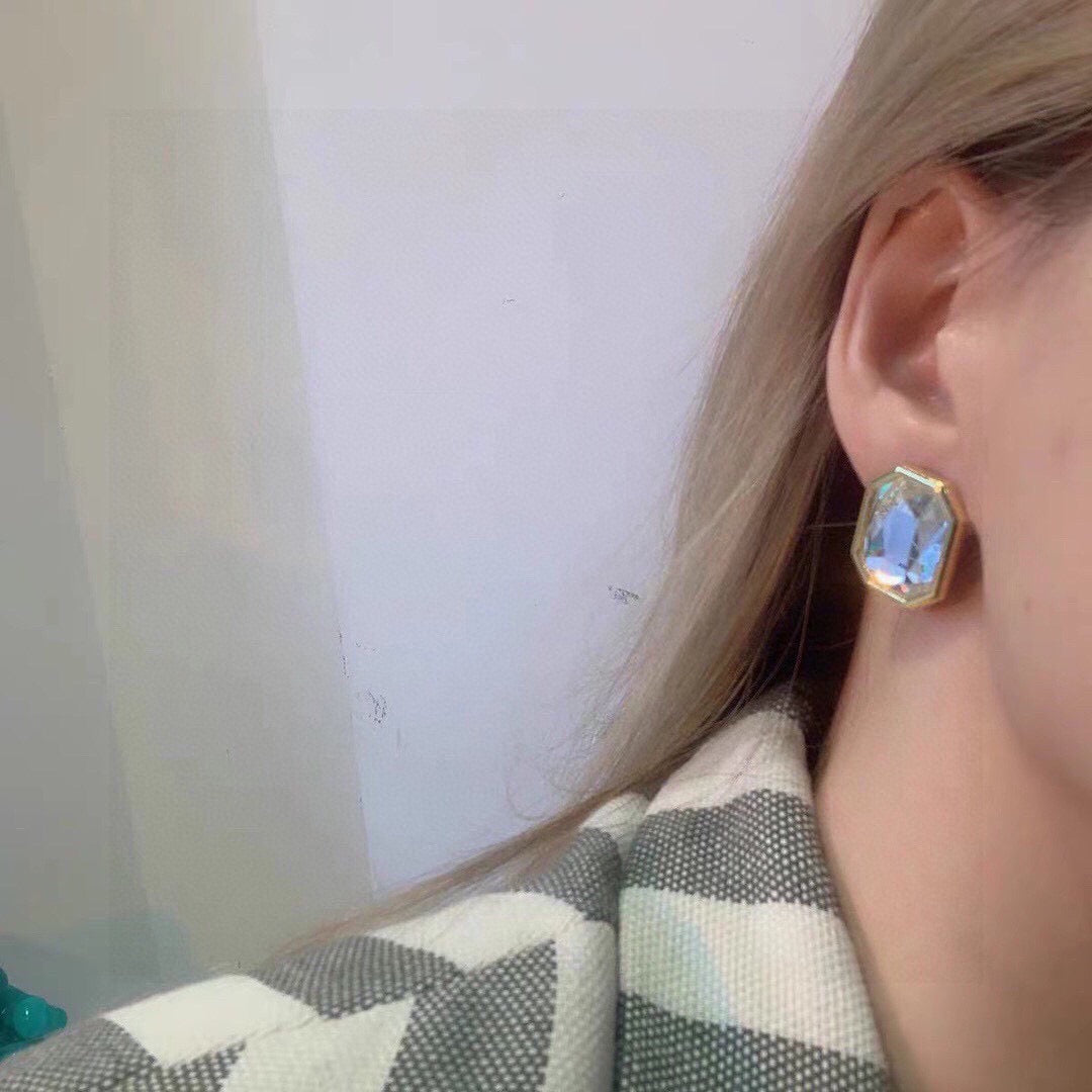 Martin Graham stud earrings in polished metal-tone – detail view