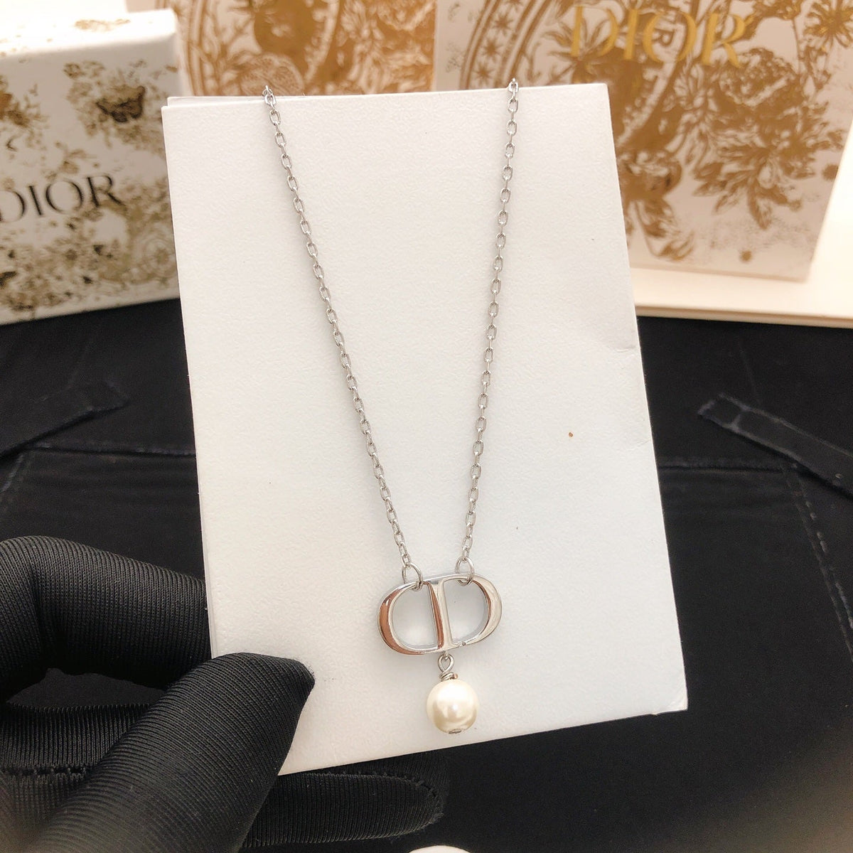Martin Graham pendant necklace in polished metal-tone – detail view