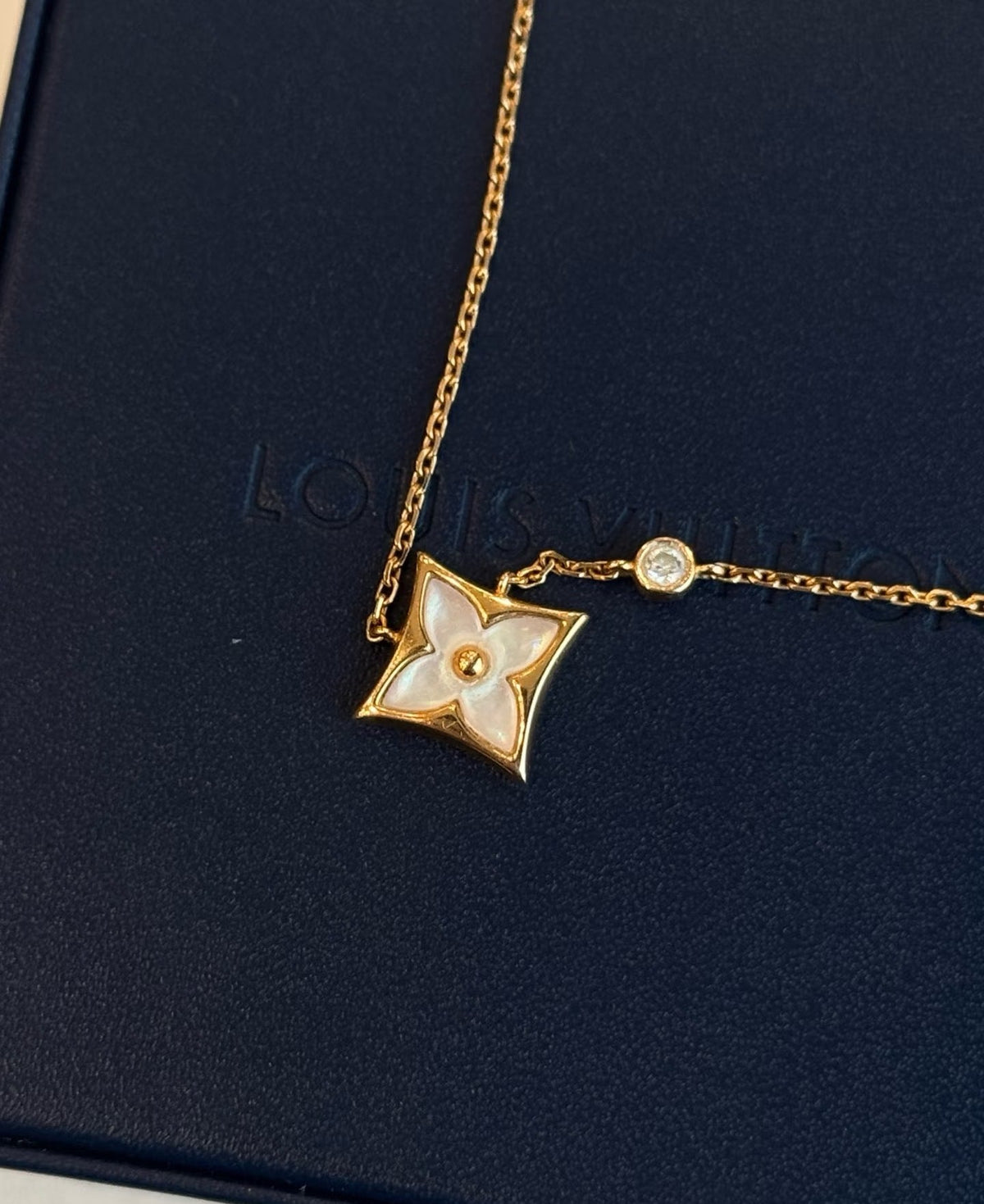 Martin Graham pendant necklace in polished metal-tone – close-up detail