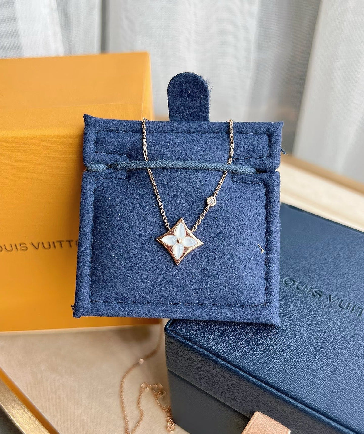 Martin Graham pendant necklace in polished metal-tone – close-up detail