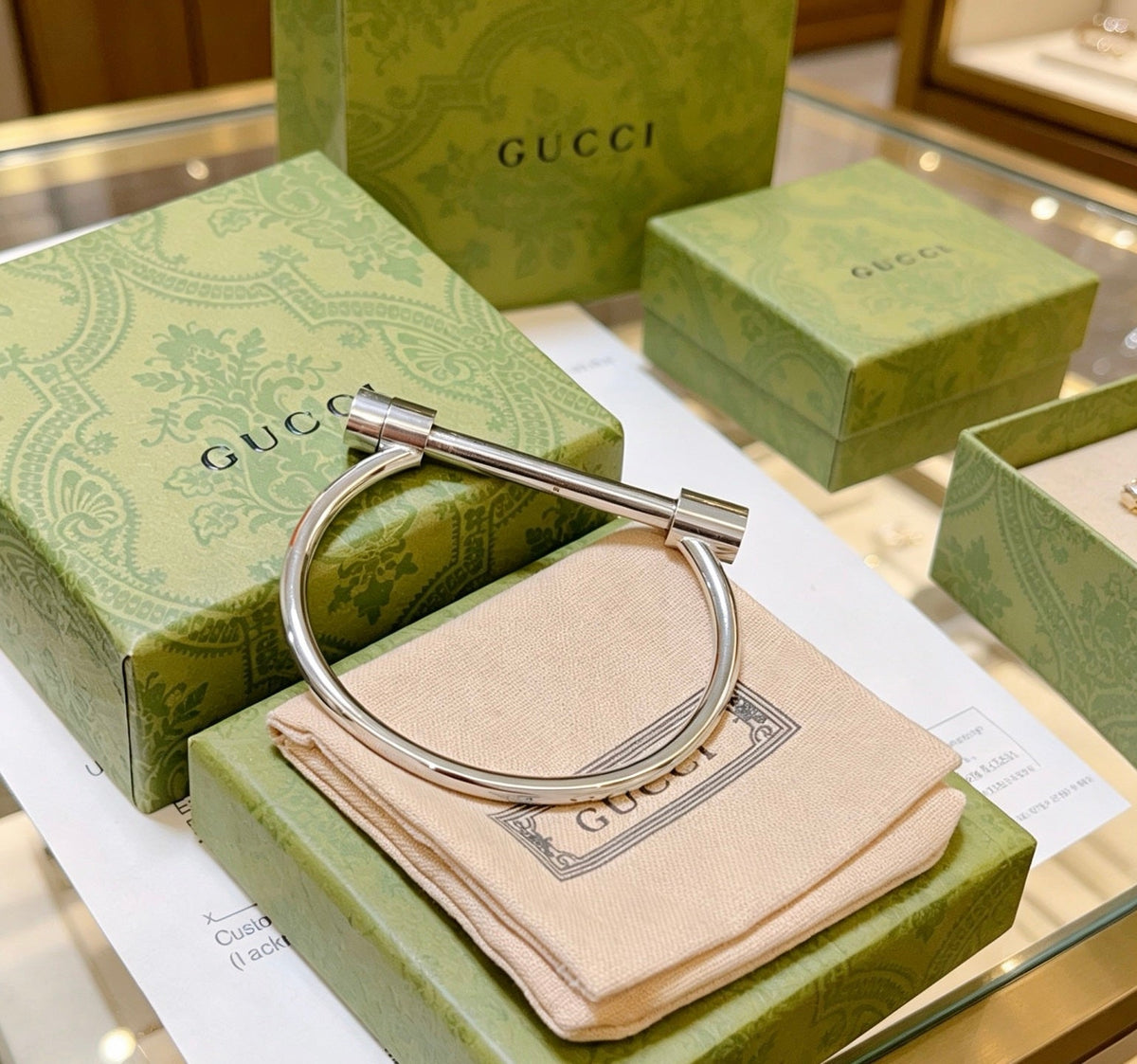 Martin Graham bangle in polished metal-tone – front product view