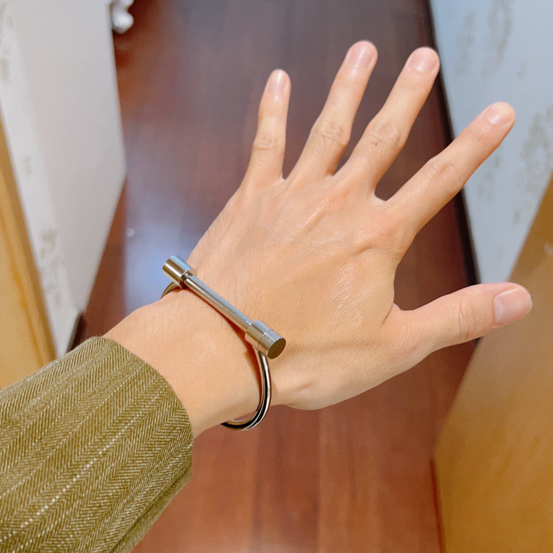 Martin Graham bangle in polished metal-tone – detail view