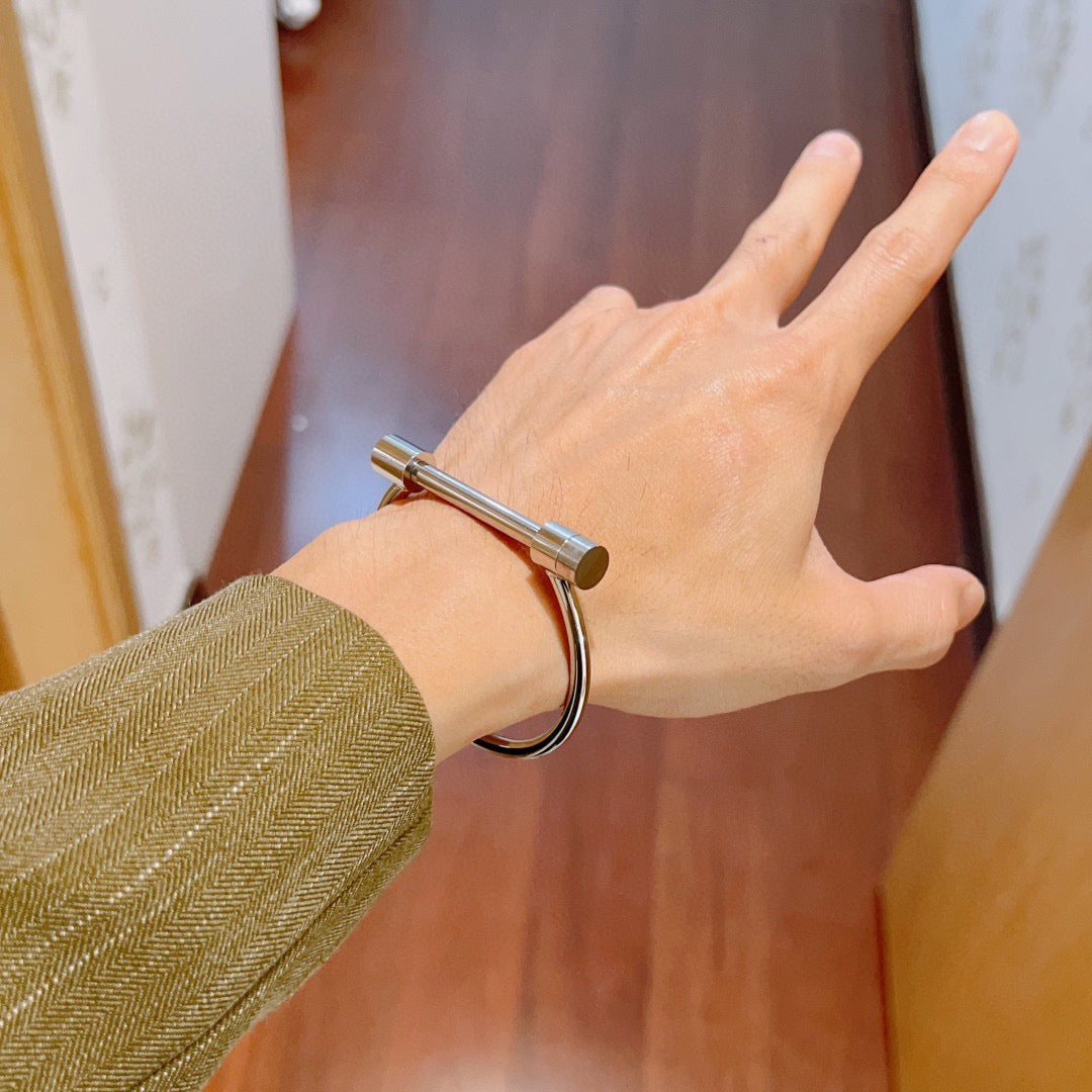 Martin Graham bangle in polished metal-tone – styled product view