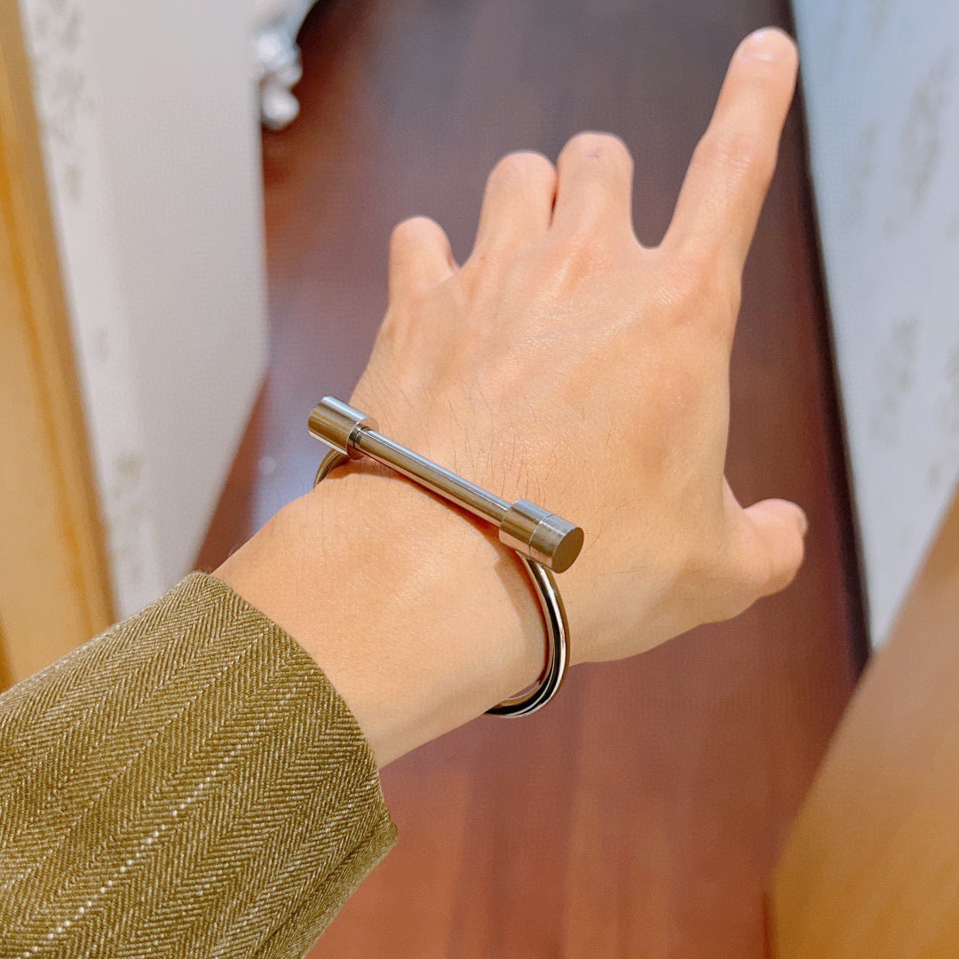 Martin Graham bangle in polished metal-tone – detail view