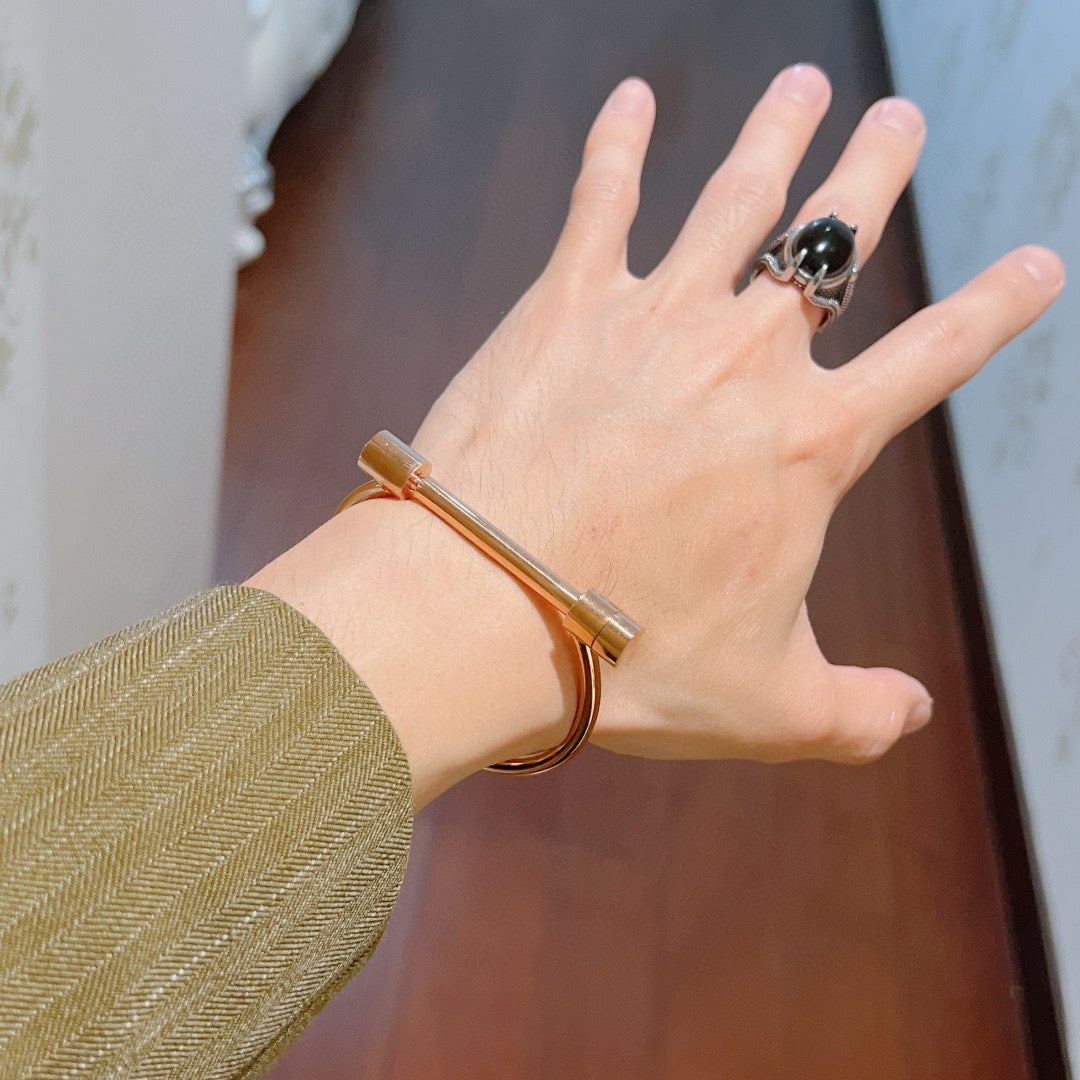 Martin Graham bangle in polished metal-tone – styled product view