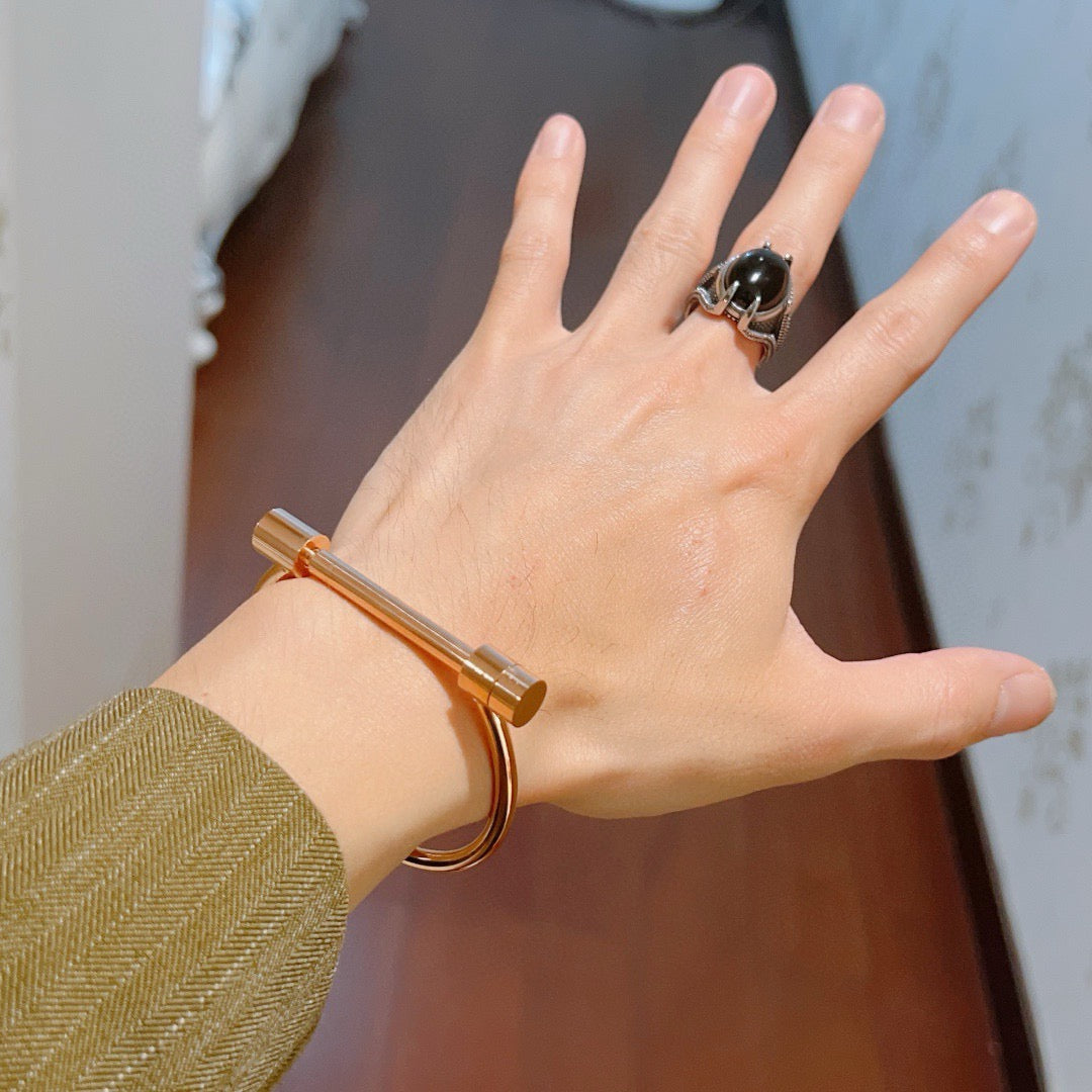 Martin Graham bangle in polished metal-tone – detail view