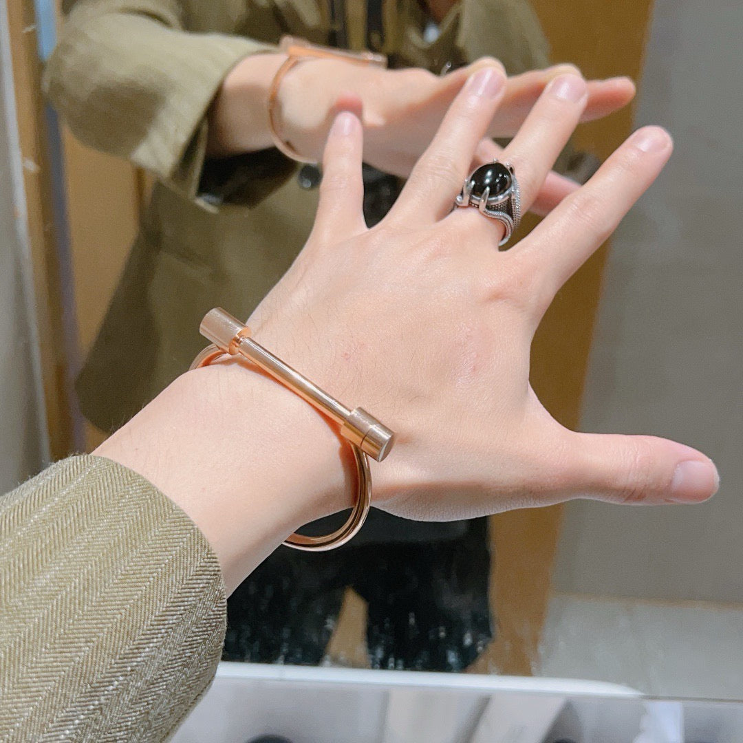 Martin Graham bangle in polished metal-tone – detail view