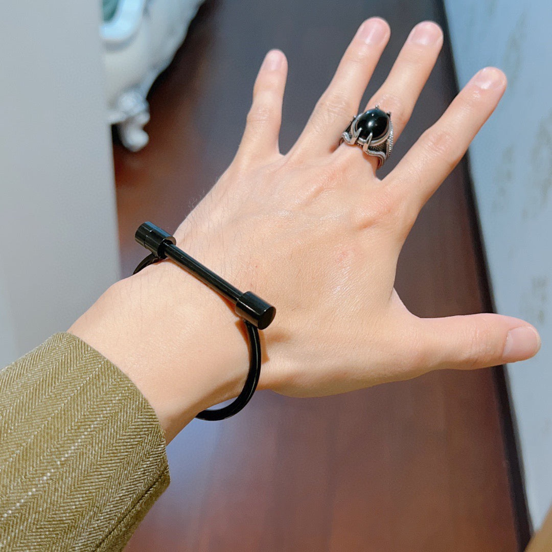 Martin Graham bangle in polished metal-tone – styled product view