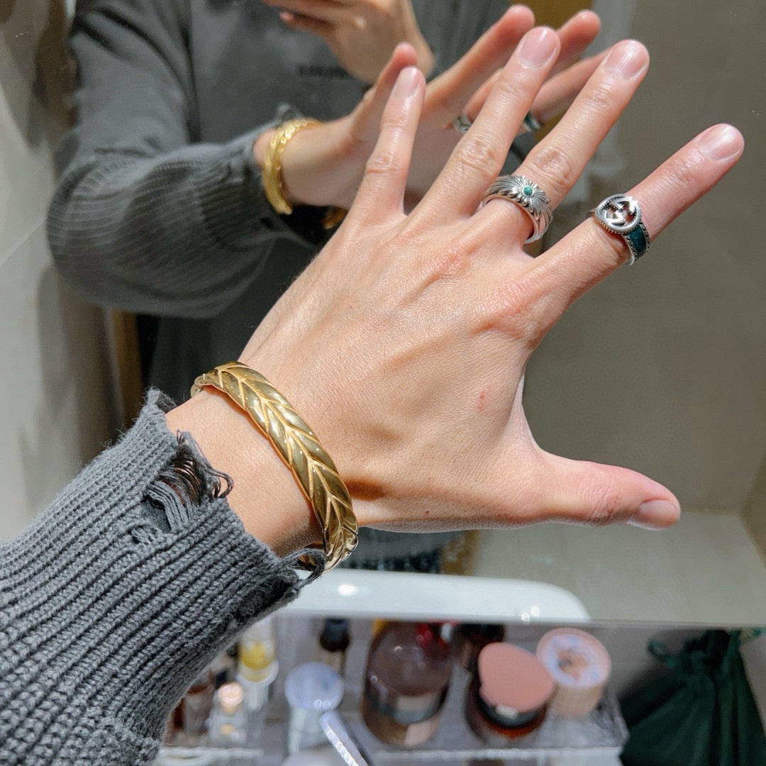 Martin Graham bangle in polished metal-tone – detail view
