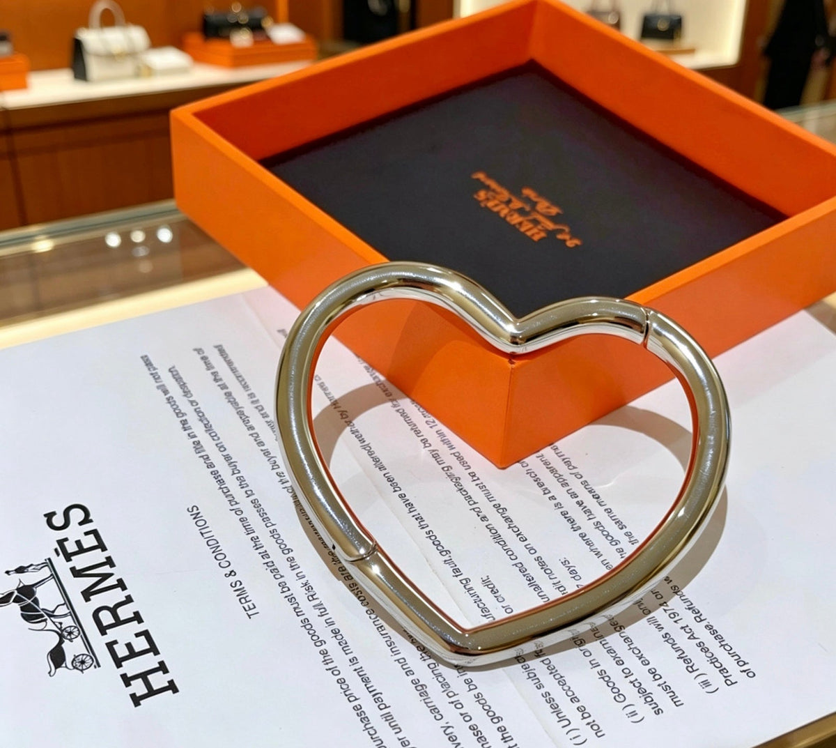 Martin Graham bangle in polished metal-tone – front product view