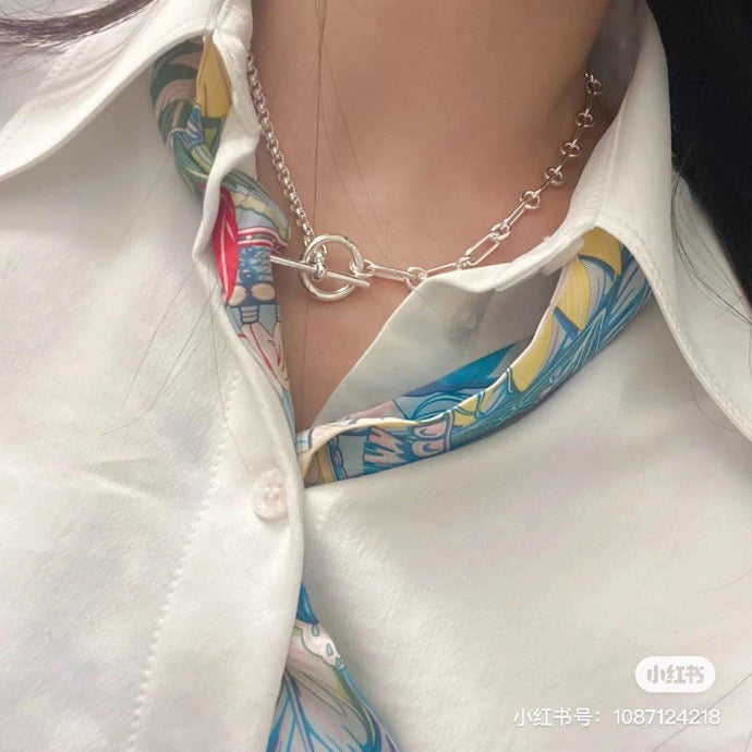 Martin Graham pendant necklace in polished metal-tone – detail view
