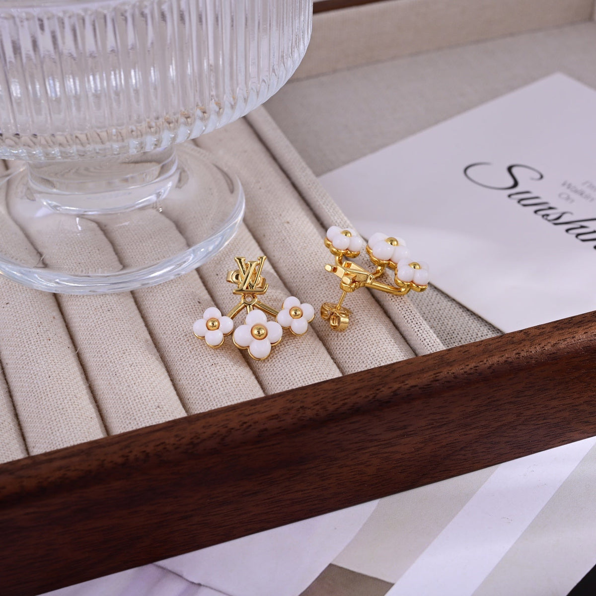 Martin Graham stud earrings in polished metal-tone – detail view
