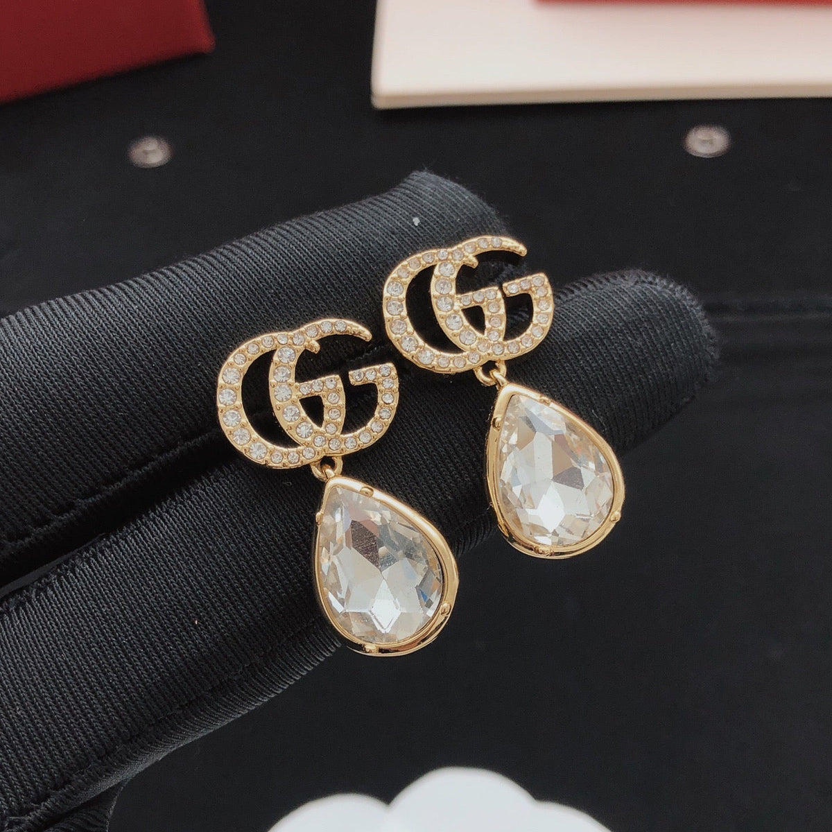 Martin Graham stud earrings in polished metal-tone – front product view