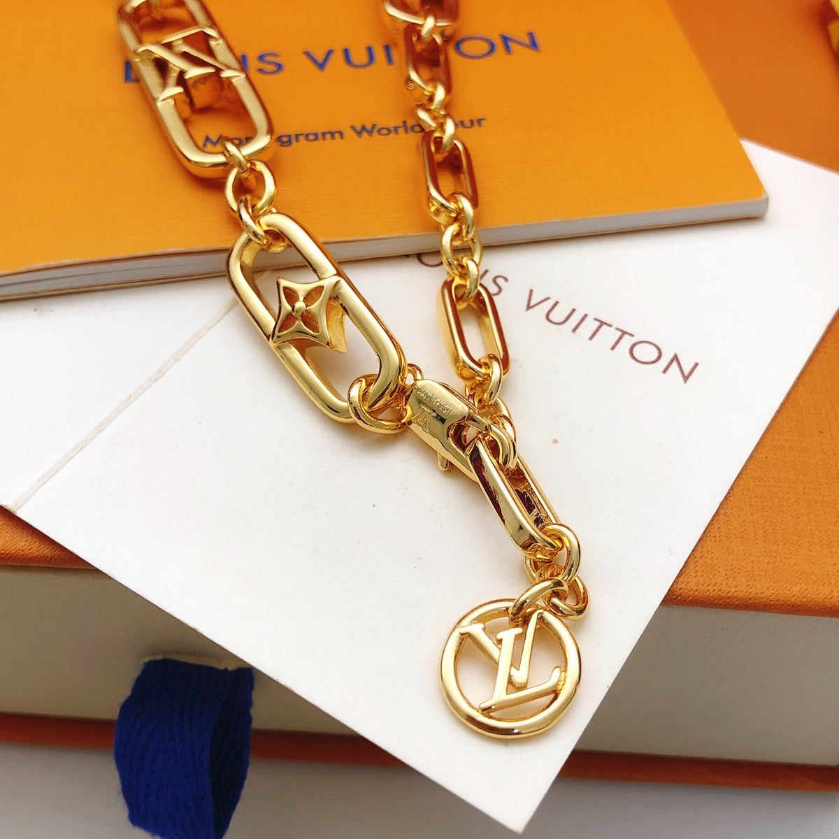 Martin Graham pendant necklace in polished metal-tone – side detail