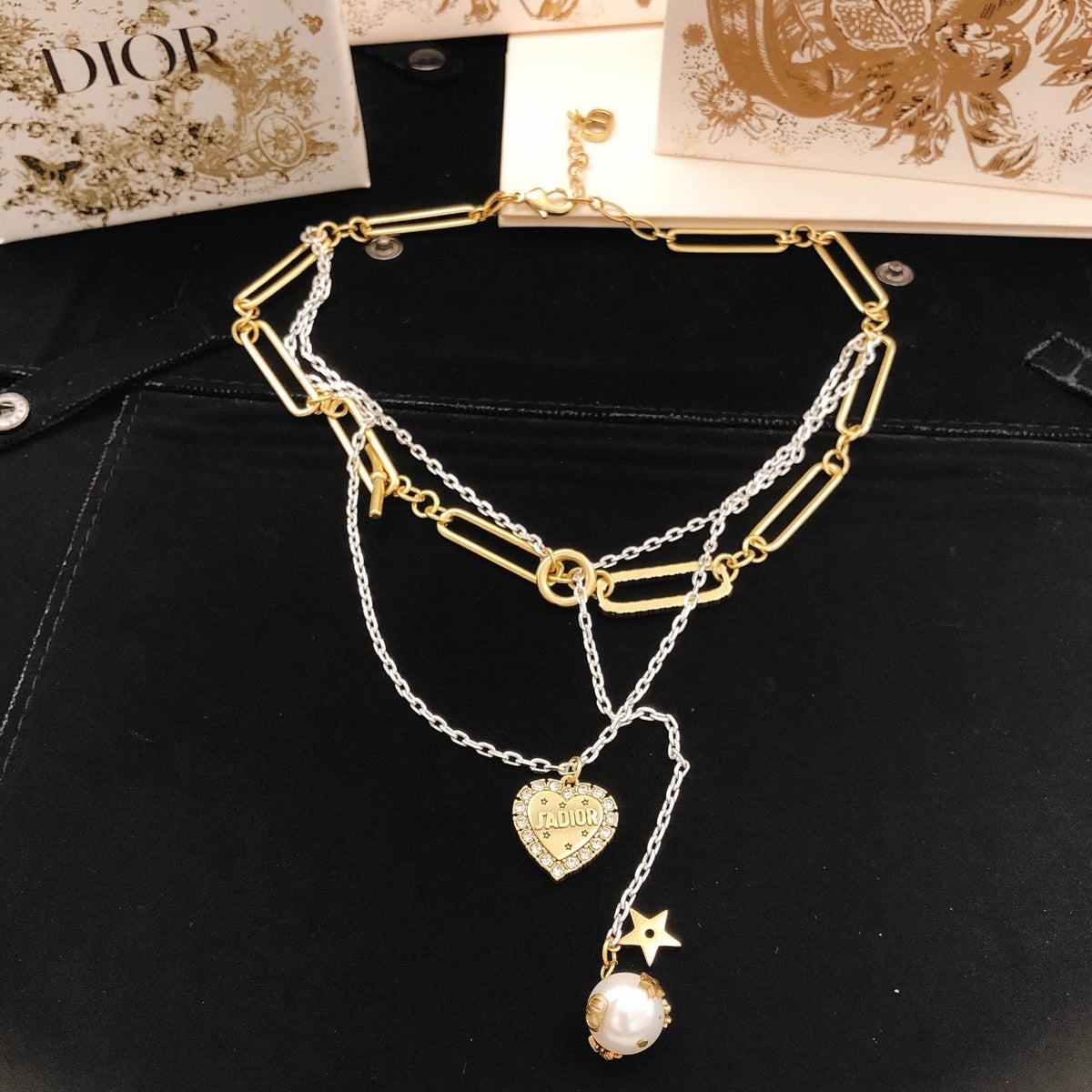 Martin Graham pendant necklace in polished metal-tone – detail view