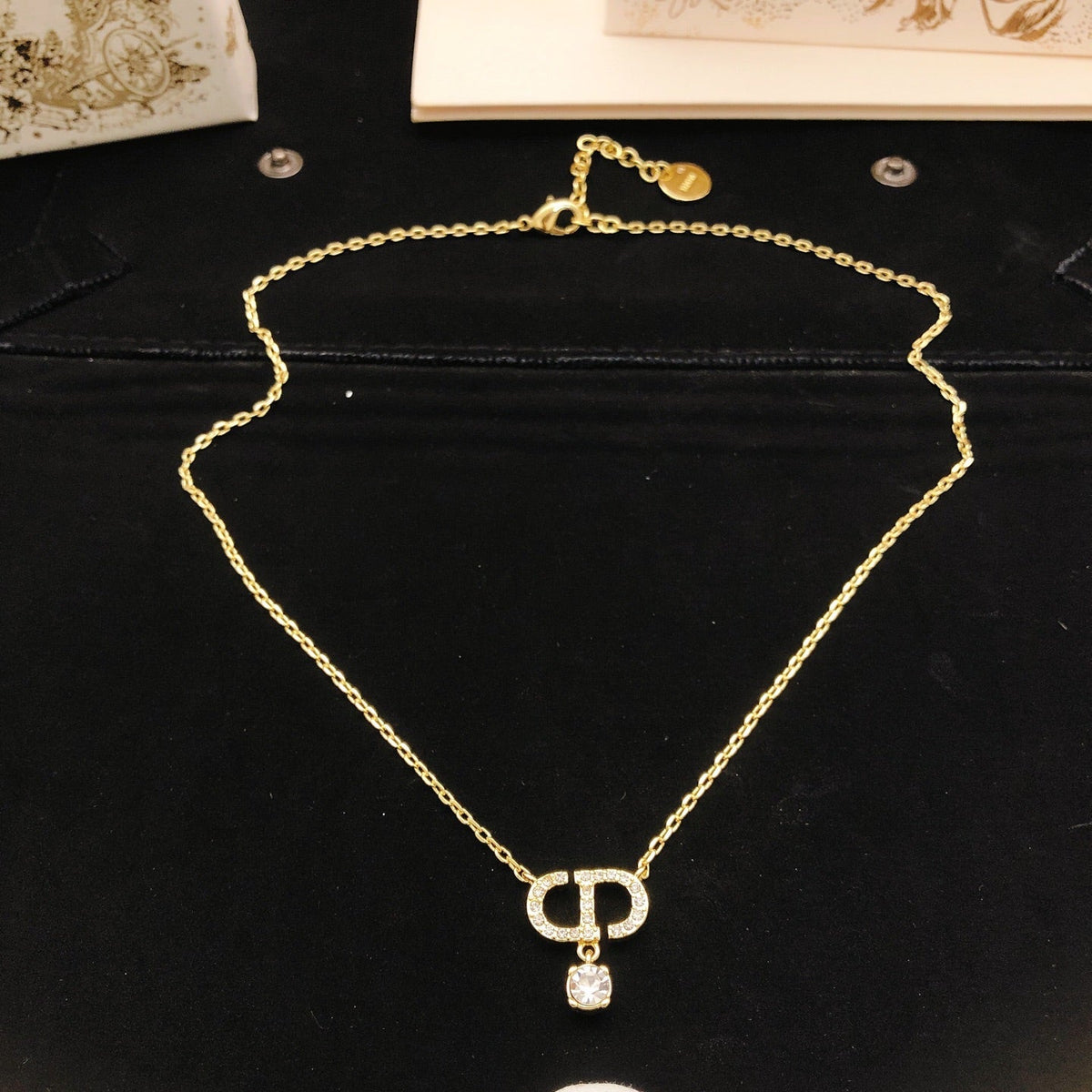 Martin Graham pendant necklace in polished metal-tone – detail view