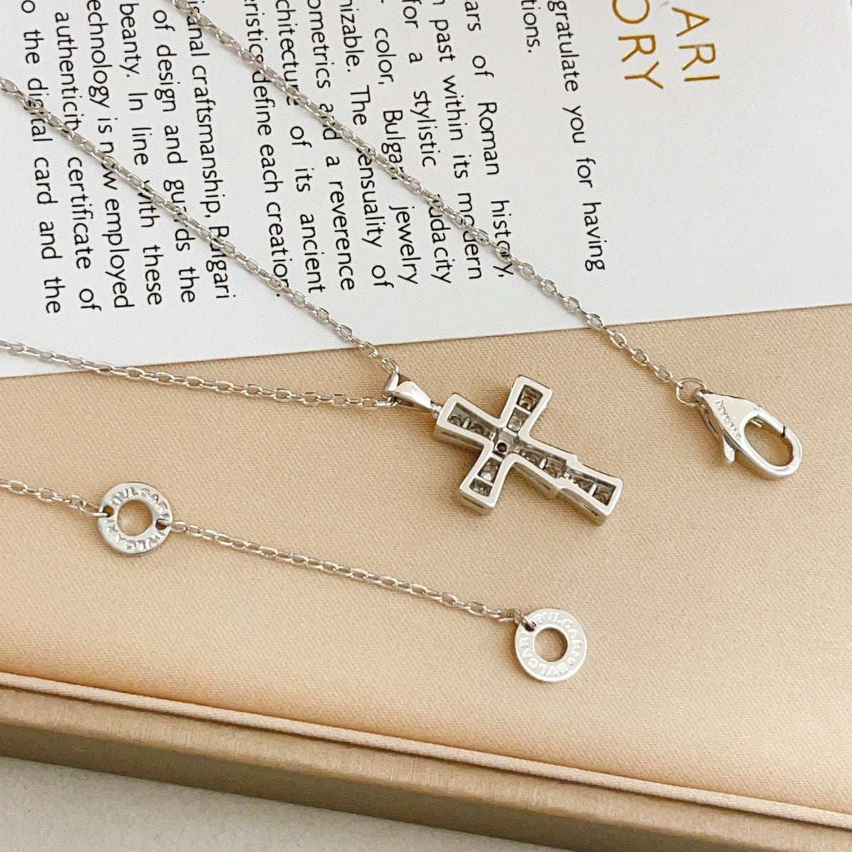 Martin Graham pendant necklace in polished metal-tone – side detail