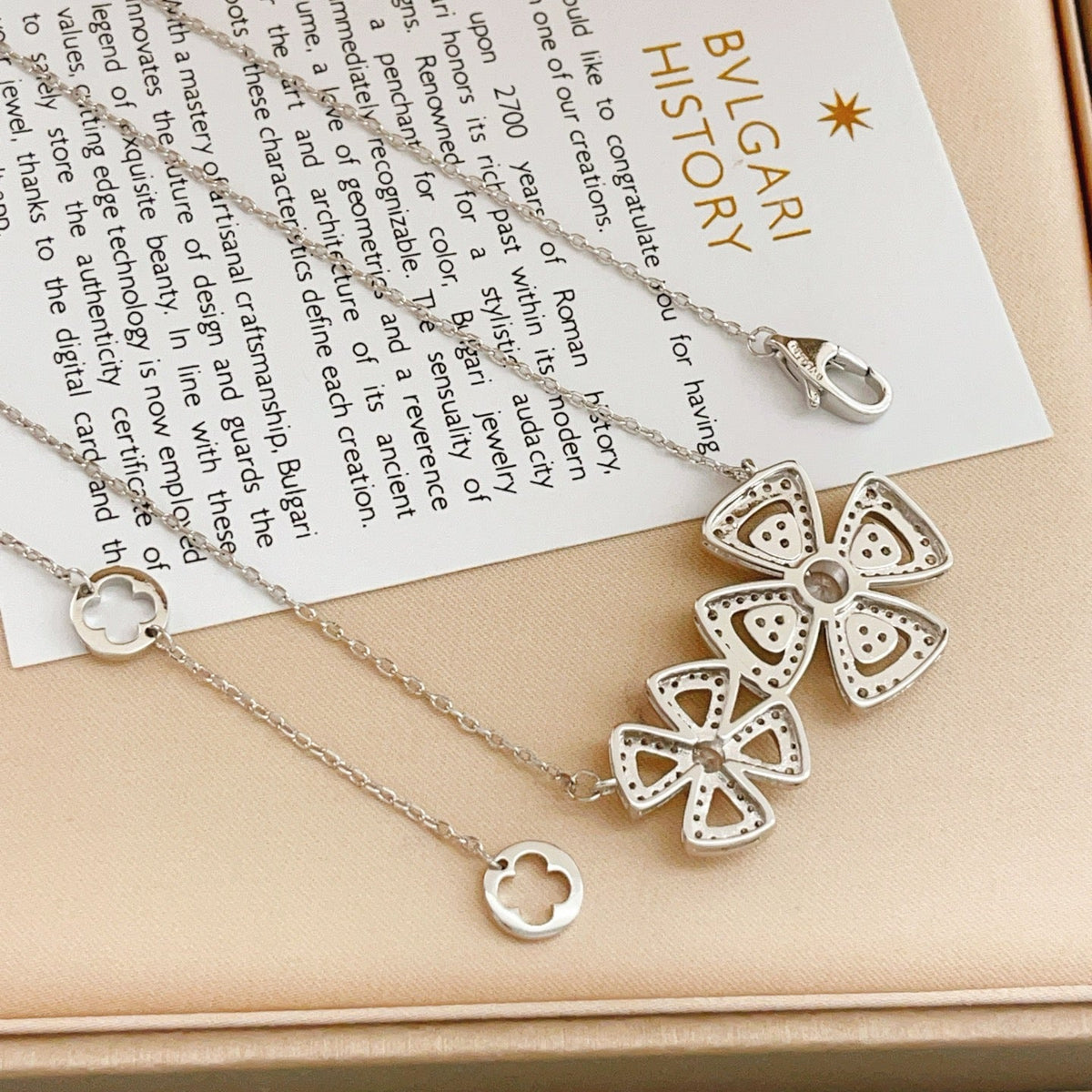 Martin Graham pendant necklace in polished metal-tone – side detail