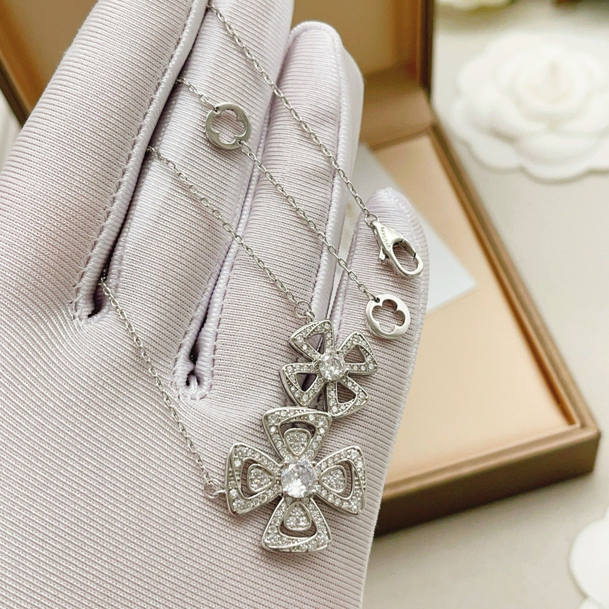 Martin Graham pendant necklace in polished metal-tone – close-up detail