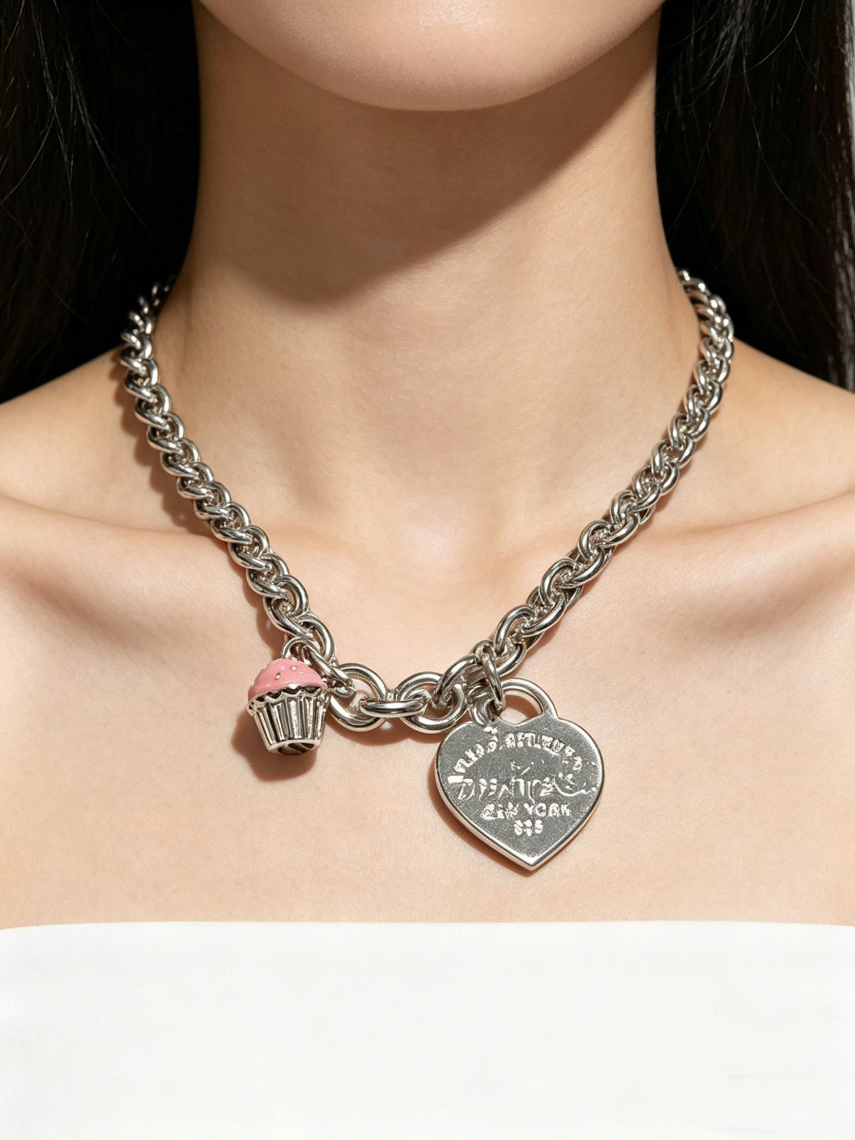 Martin Graham pendant necklace in polished metal-tone – close-up detail