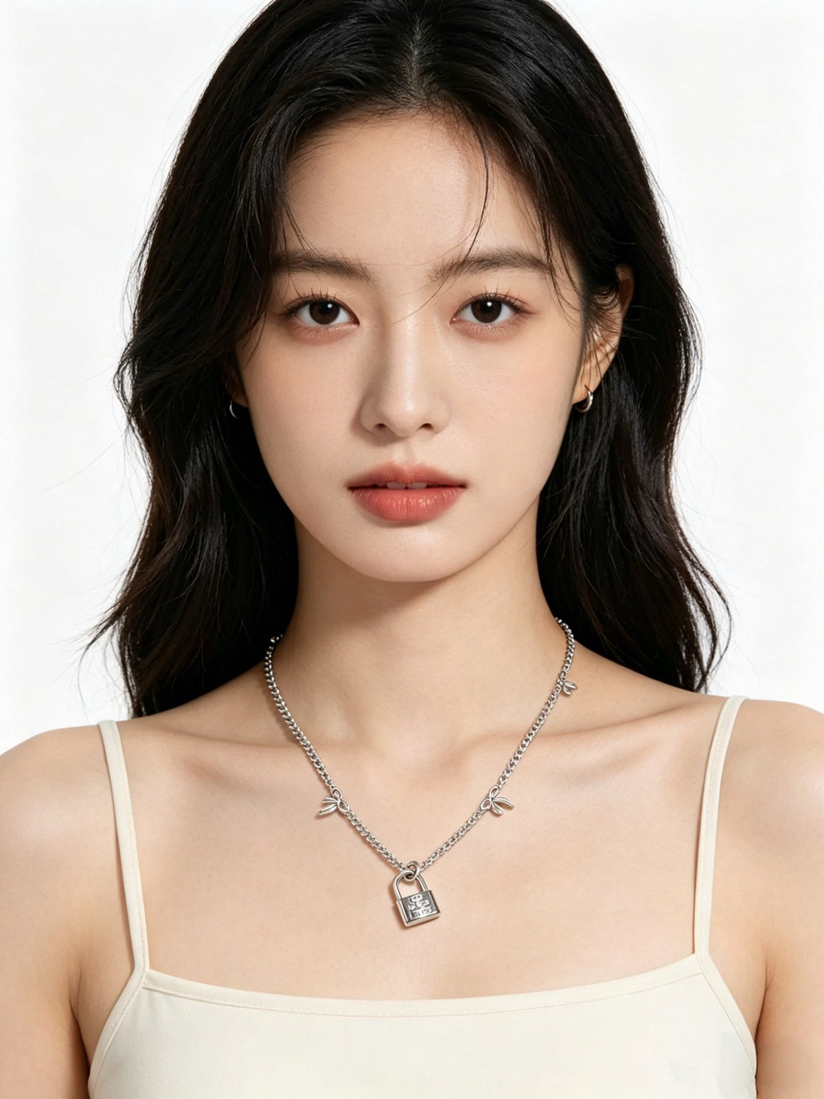 Martin Graham pendant necklace in polished metal-tone – close-up detail