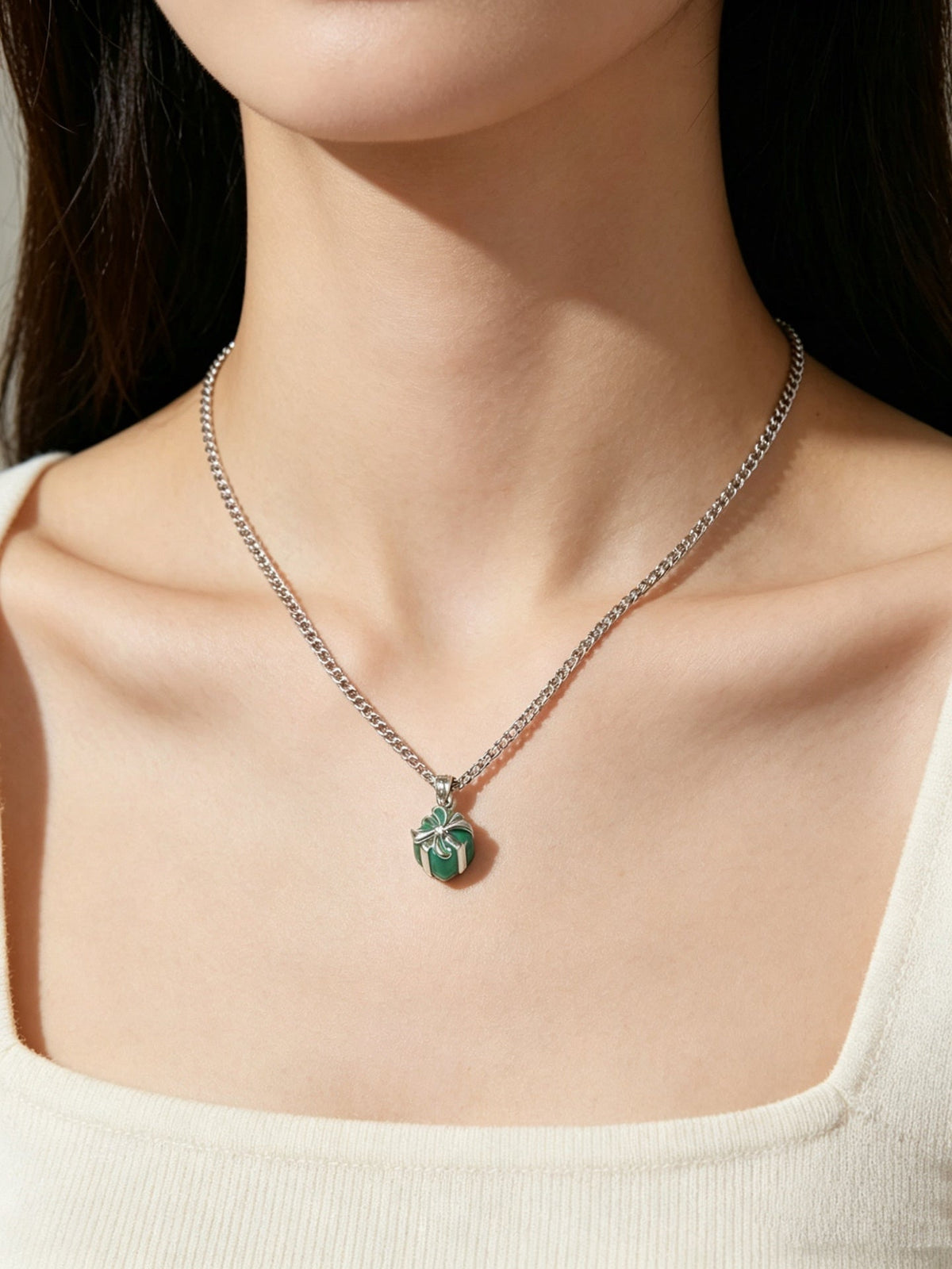 Martin Graham pendant necklace in polished metal-tone – close-up detail