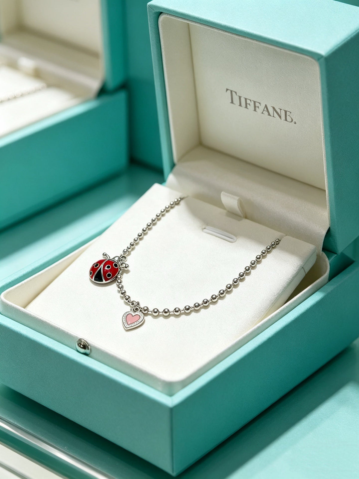 Martin Graham pendant necklace in polished metal-tone – detail view
