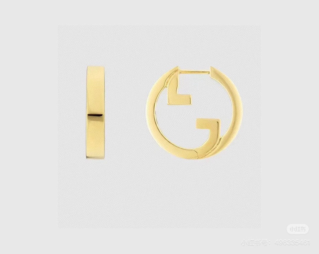Martin Graham stud earrings in polished metal-tone – front product view