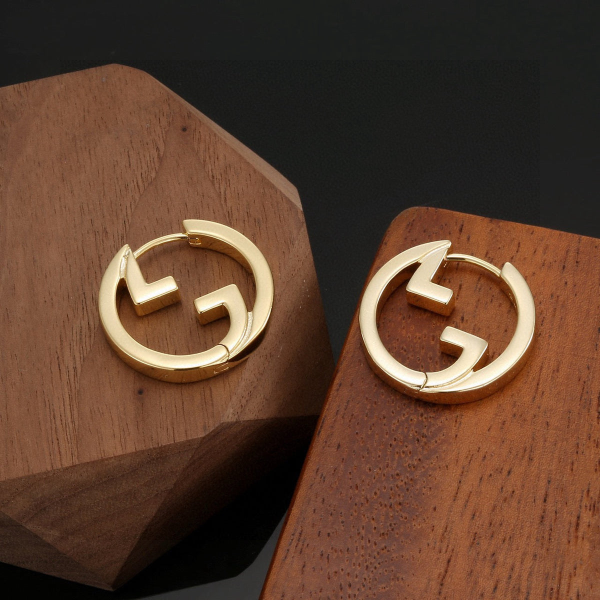 Martin Graham stud earrings in polished metal-tone – main product view