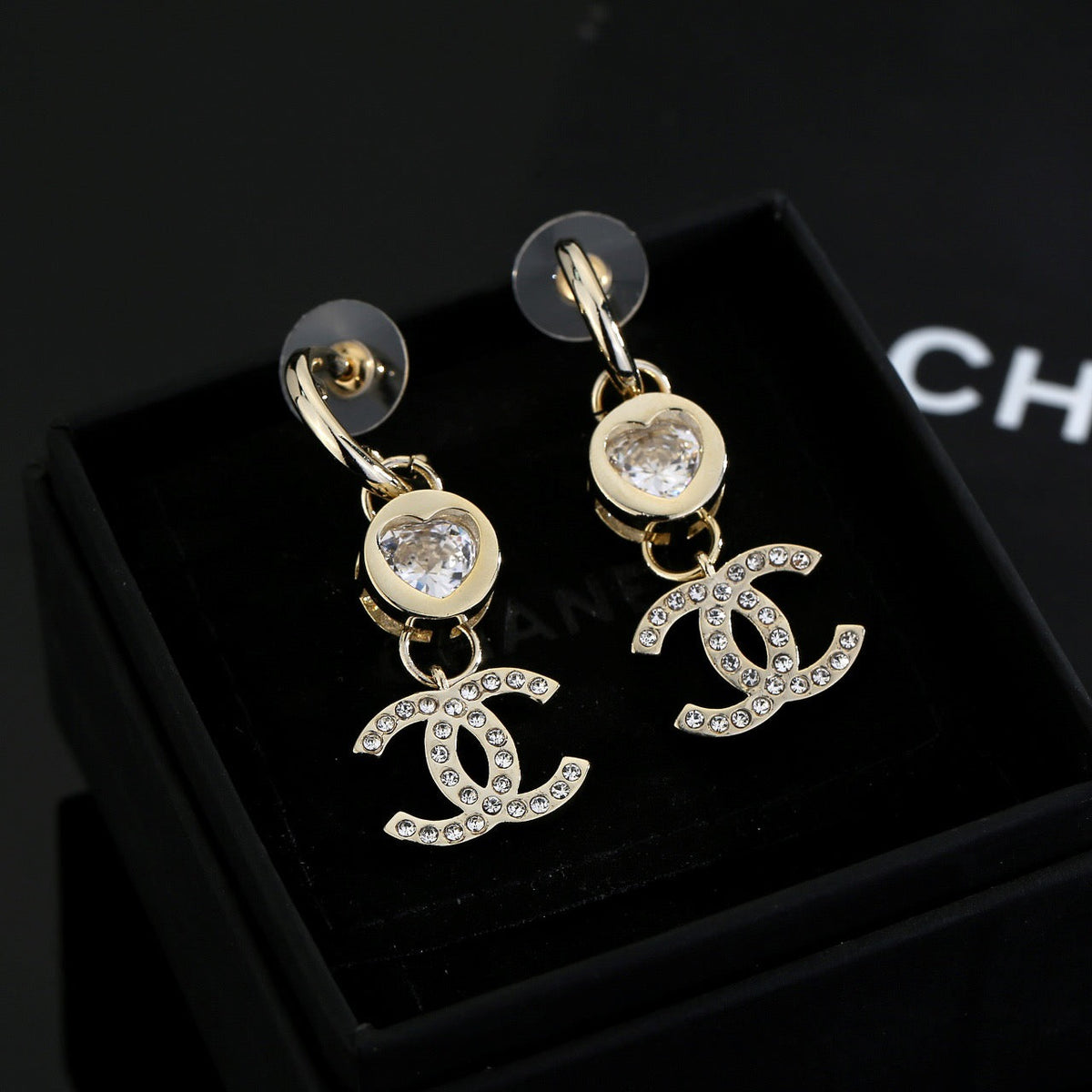 Martin Graham stud earrings in polished metal-tone – front product view