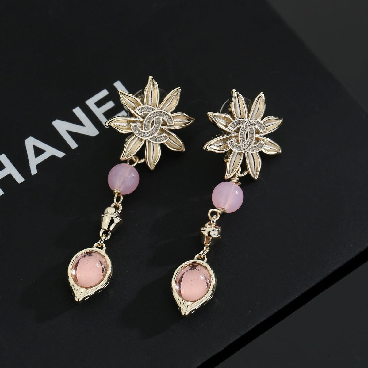 Martin Graham stud earrings in polished metal-tone – styled product view