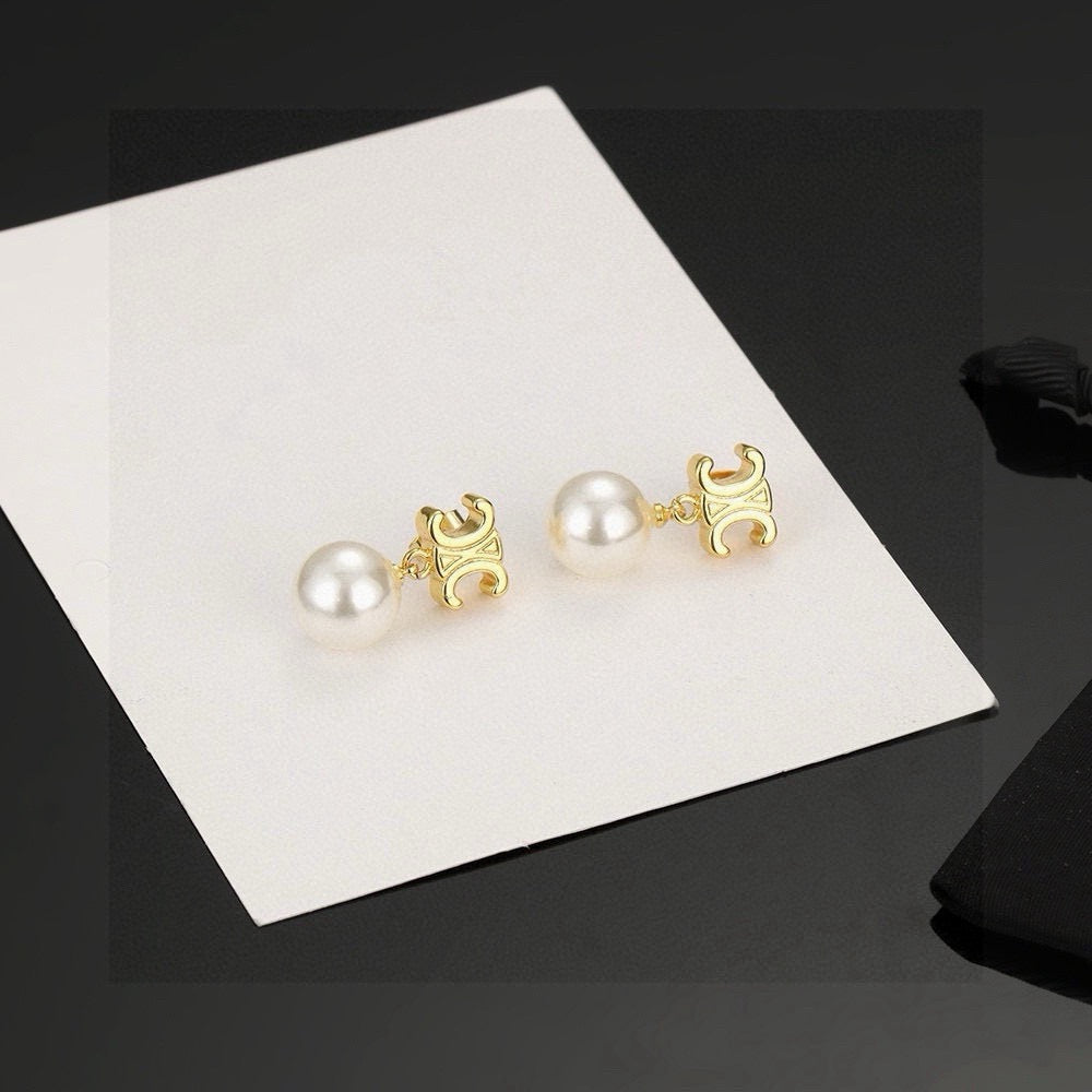Martin Graham stud earrings in polished metal-tone