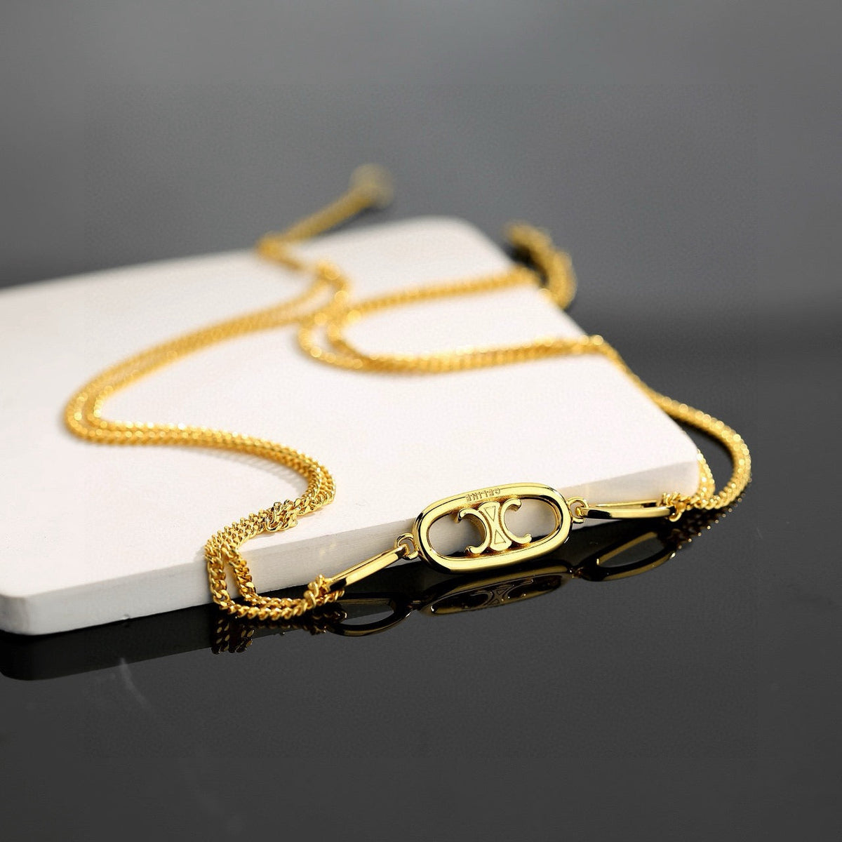 Martin Graham bracelet in polished metal-tone – side detail