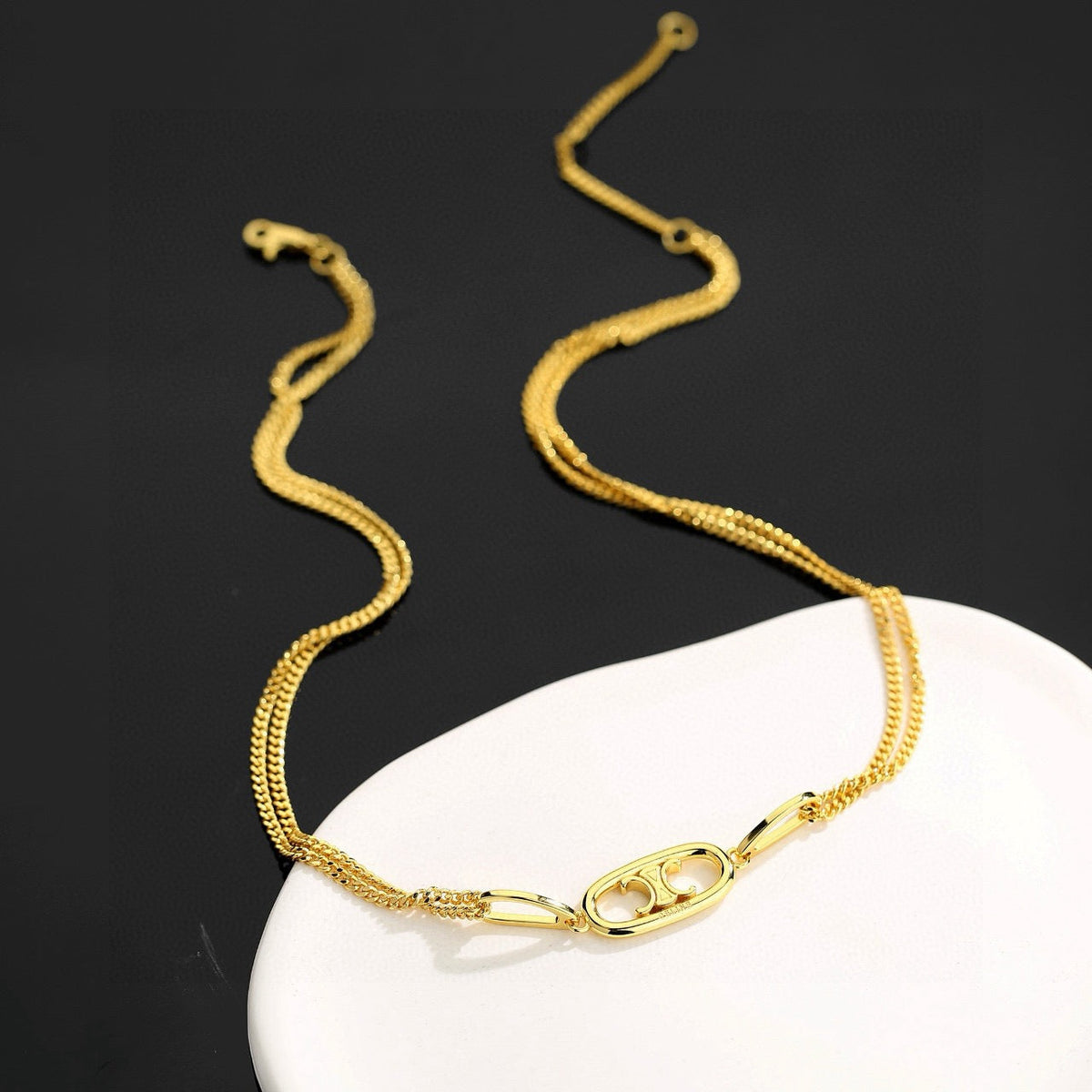 Martin Graham bracelet in polished metal-tone – close-up detail