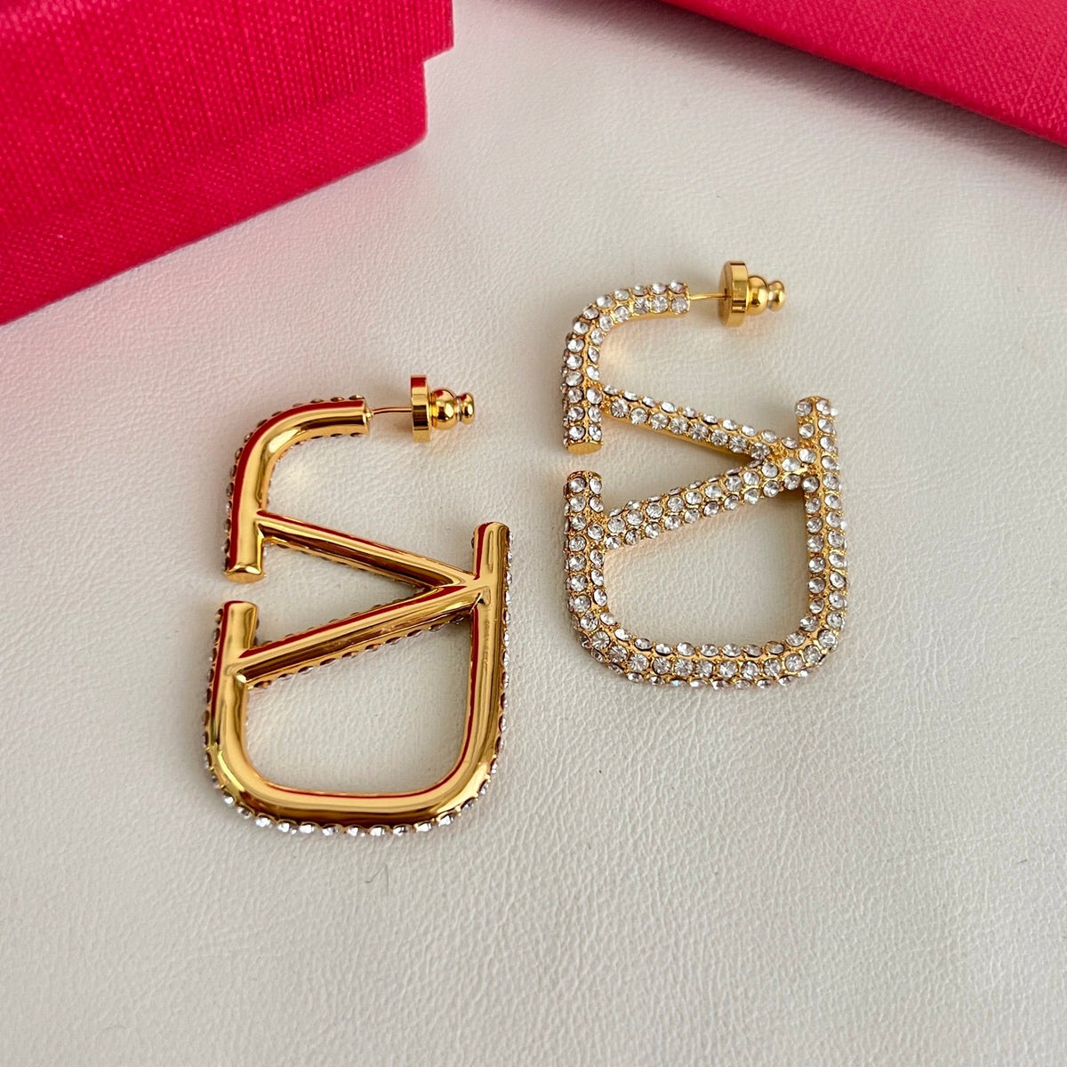 Martin Graham earrings in polished metal-tone