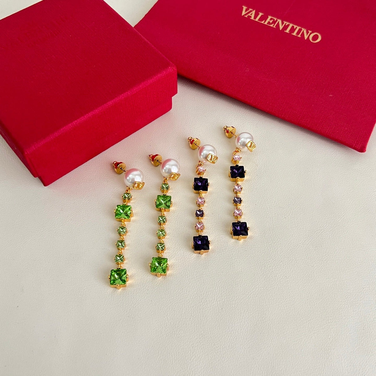 Martin Graham stud earrings in polished metal-tone – detail view