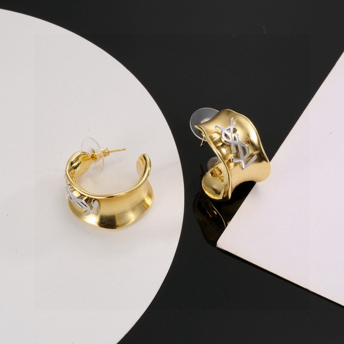 Martin Graham stud earrings in polished metal-tone – side detail