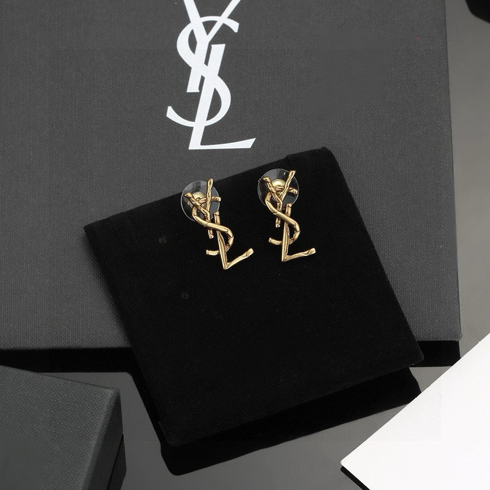 Martin Graham stud earrings in polished metal-tone – front product view