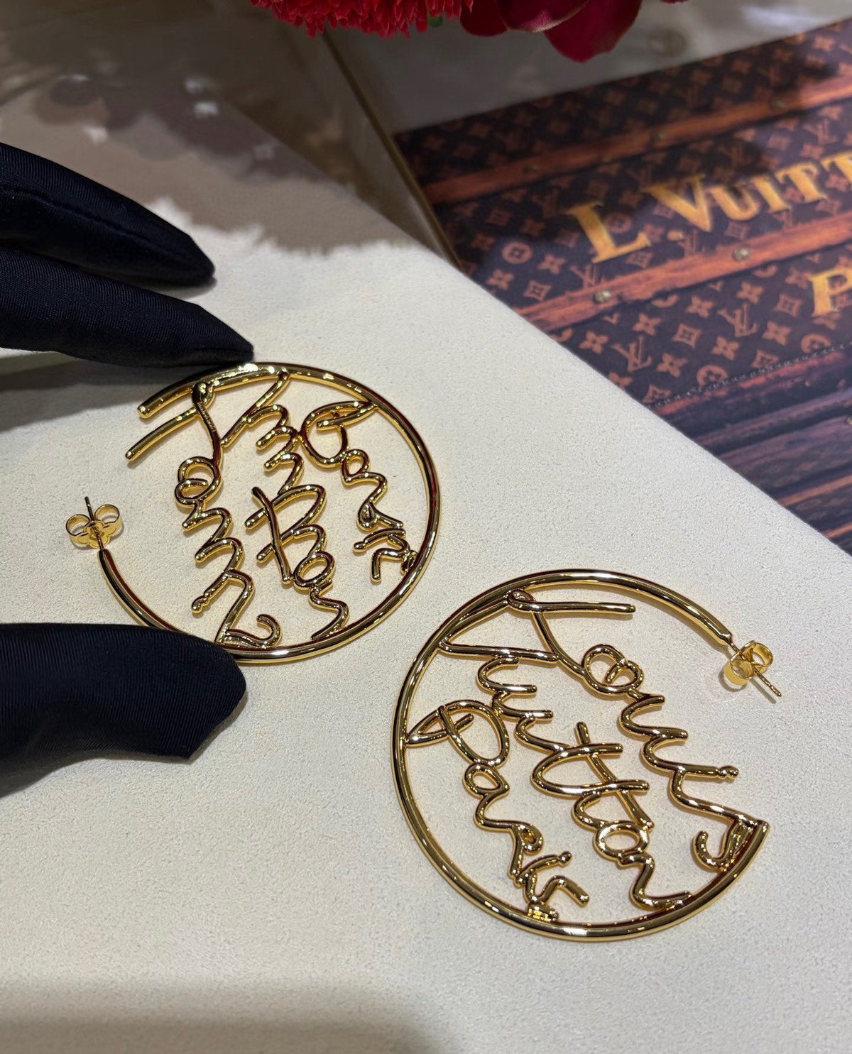 Martin Graham stud earrings in polished metal-tone – front product view