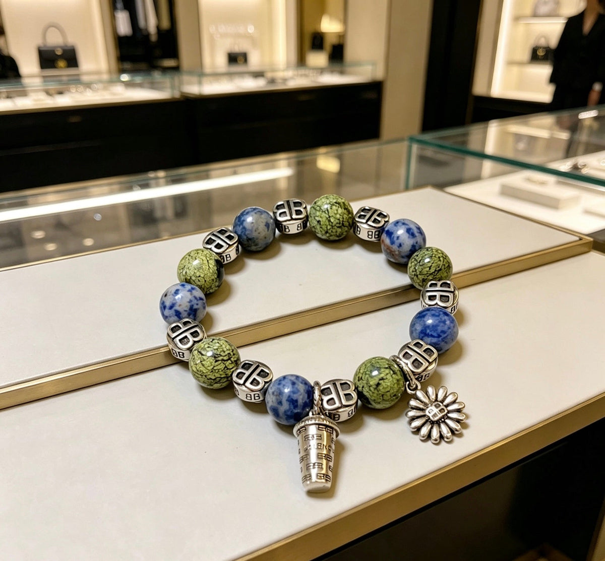 Martin Graham bracelet in polished metal-tone – close-up detail