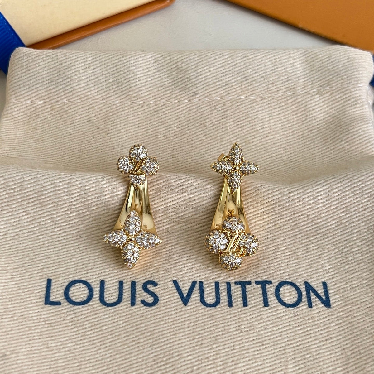 Martin Graham stud earrings in polished metal-tone – detail view