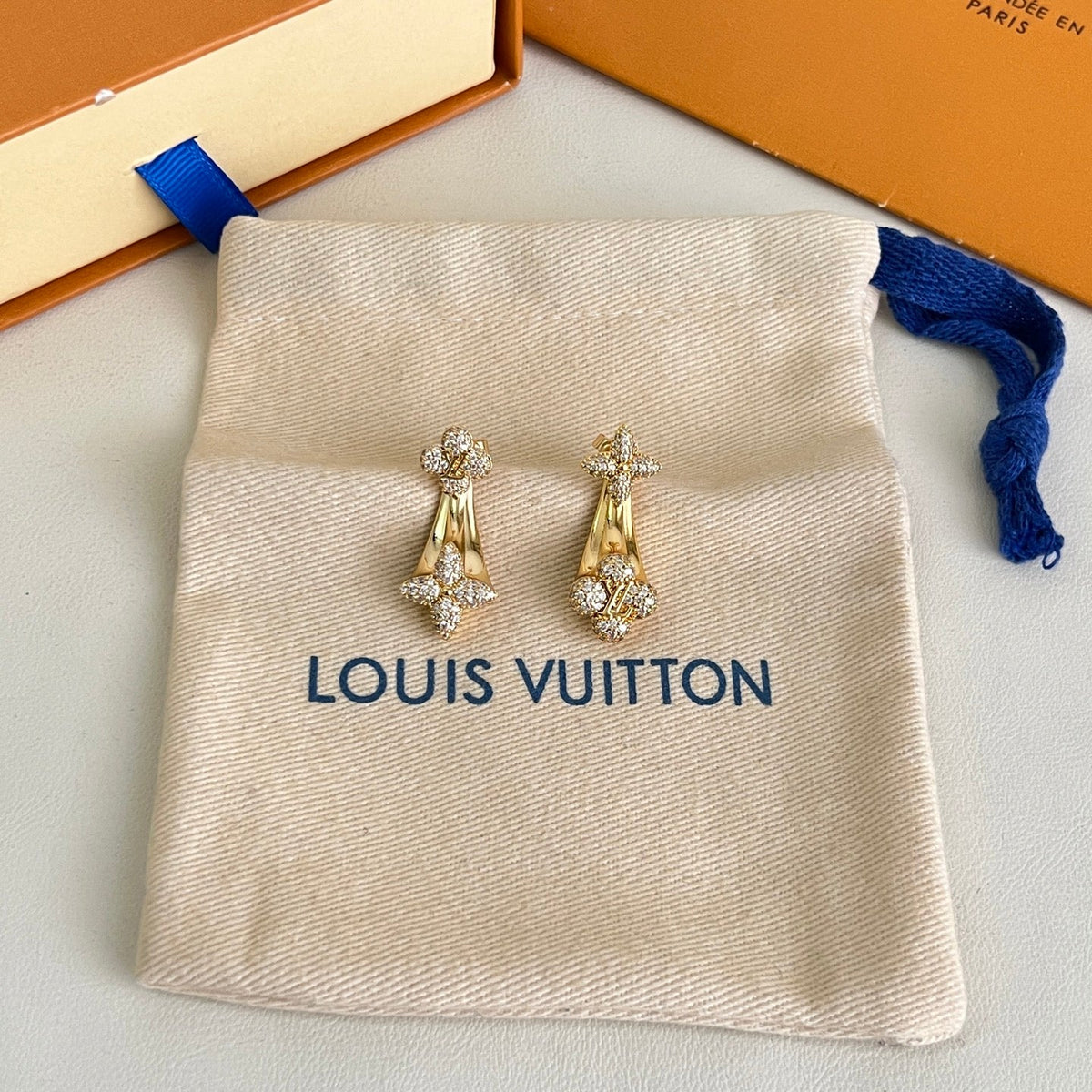Martin Graham stud earrings in polished metal-tone – front product view