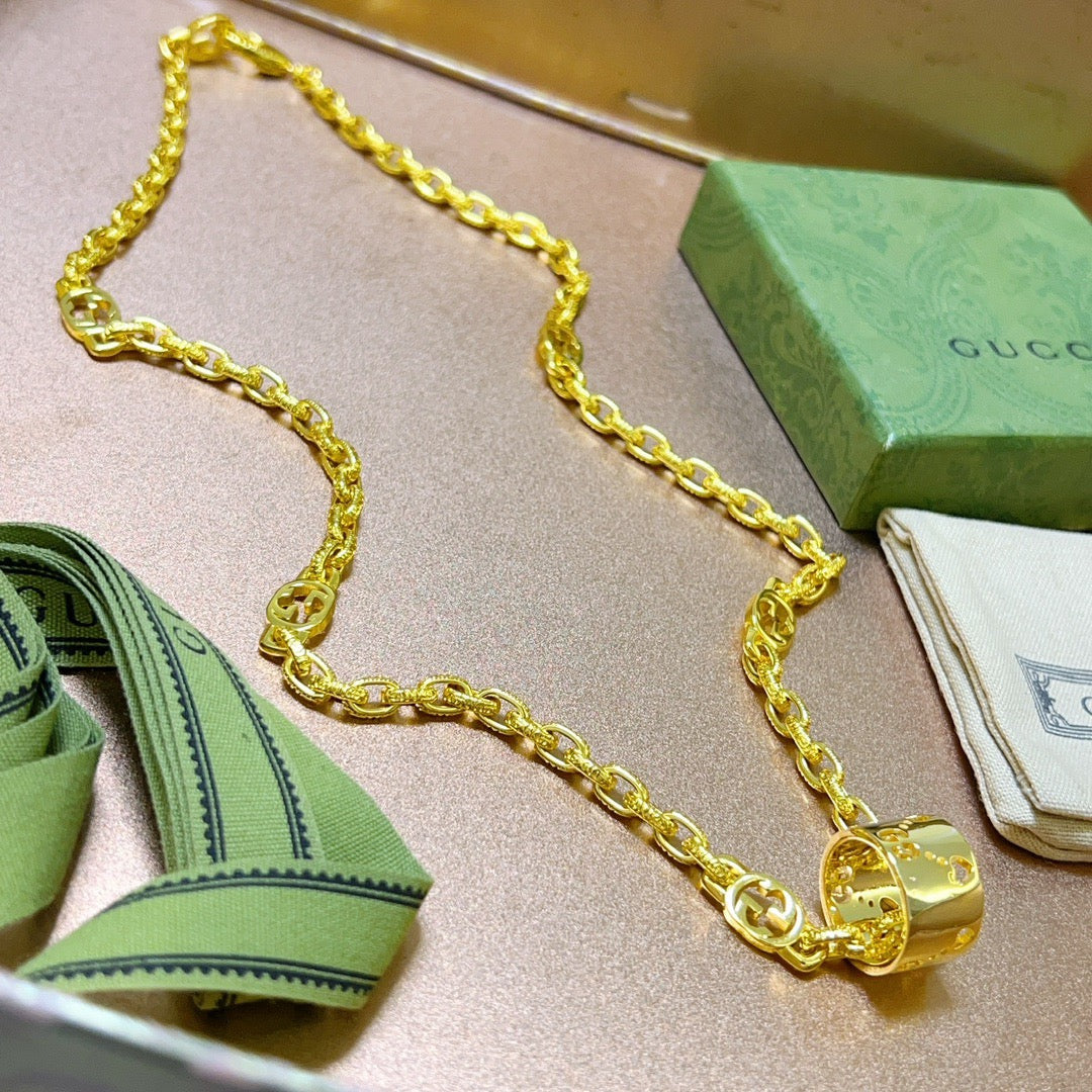 Martin Graham pendant necklace in polished metal-tone – front product view