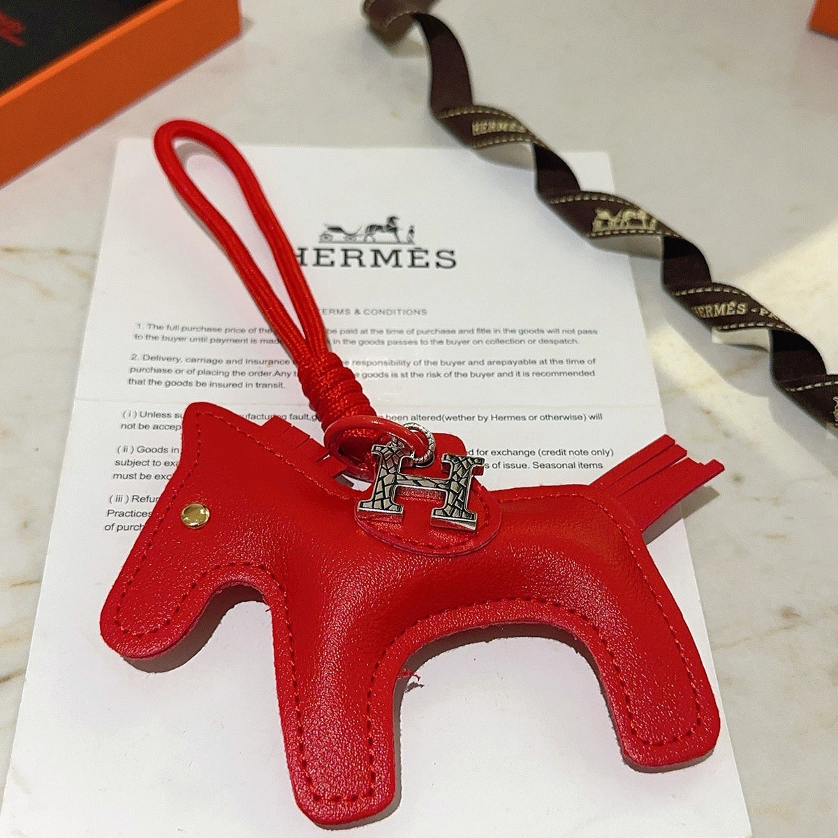 Martin Graham keychain in polished metal-tone – front product view