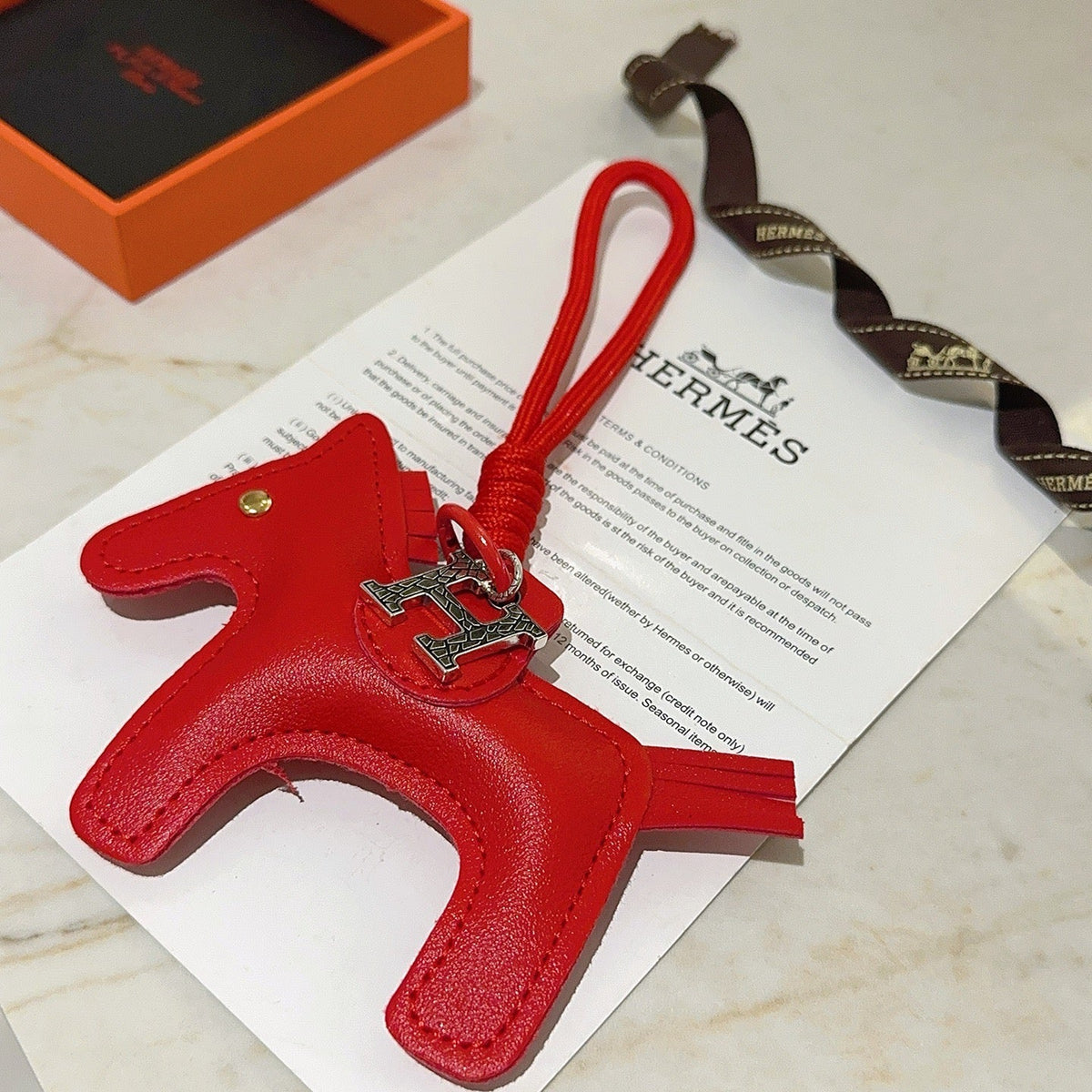 Martin Graham keychain in polished metal-tone – detail view