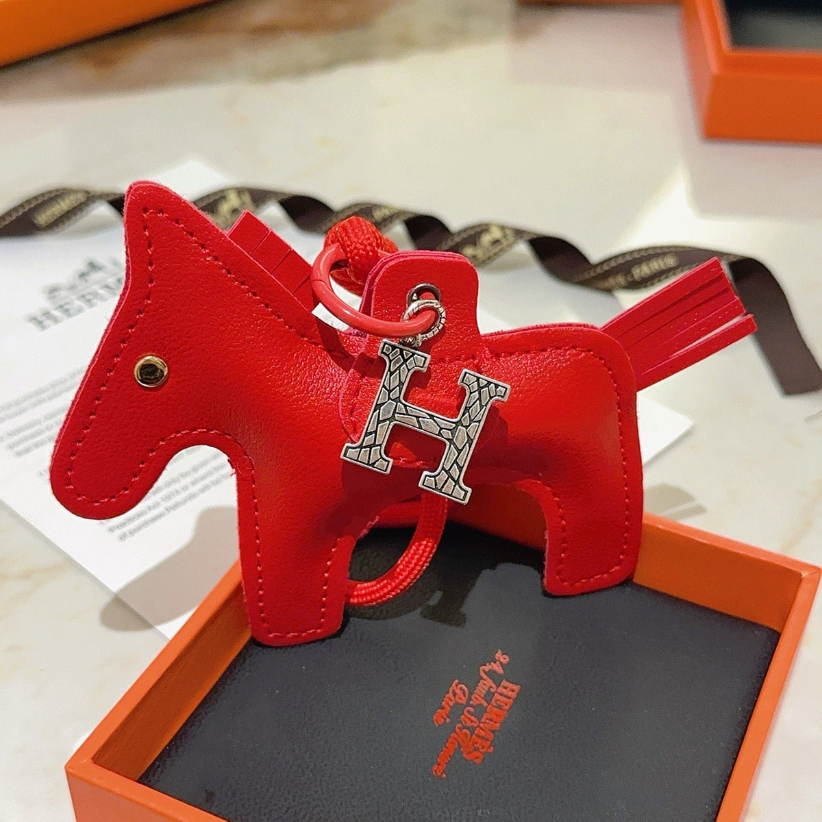 Martin Graham keychain in polished metal-tone – close-up detail