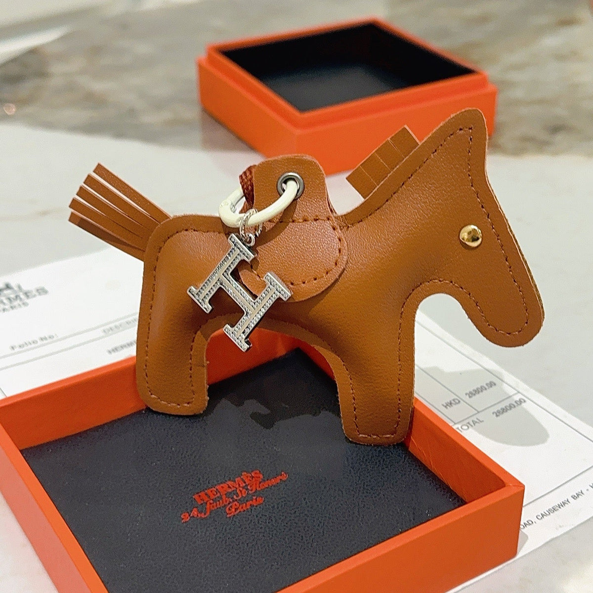 Martin Graham keychain in polished metal-tone – close-up detail