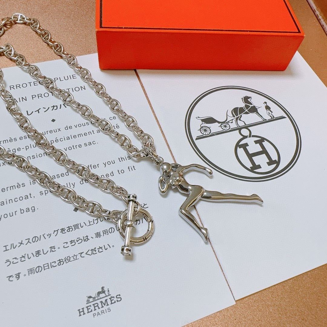 Martin Graham pendant necklace in polished metal-tone – detail view